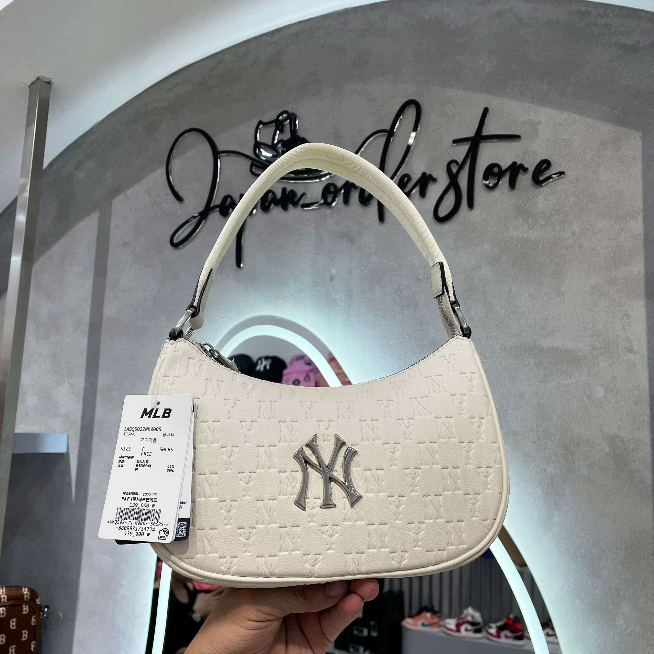 Túi MLB Monogram Embossed Hobo White Bag 3ABQS022N50CRS