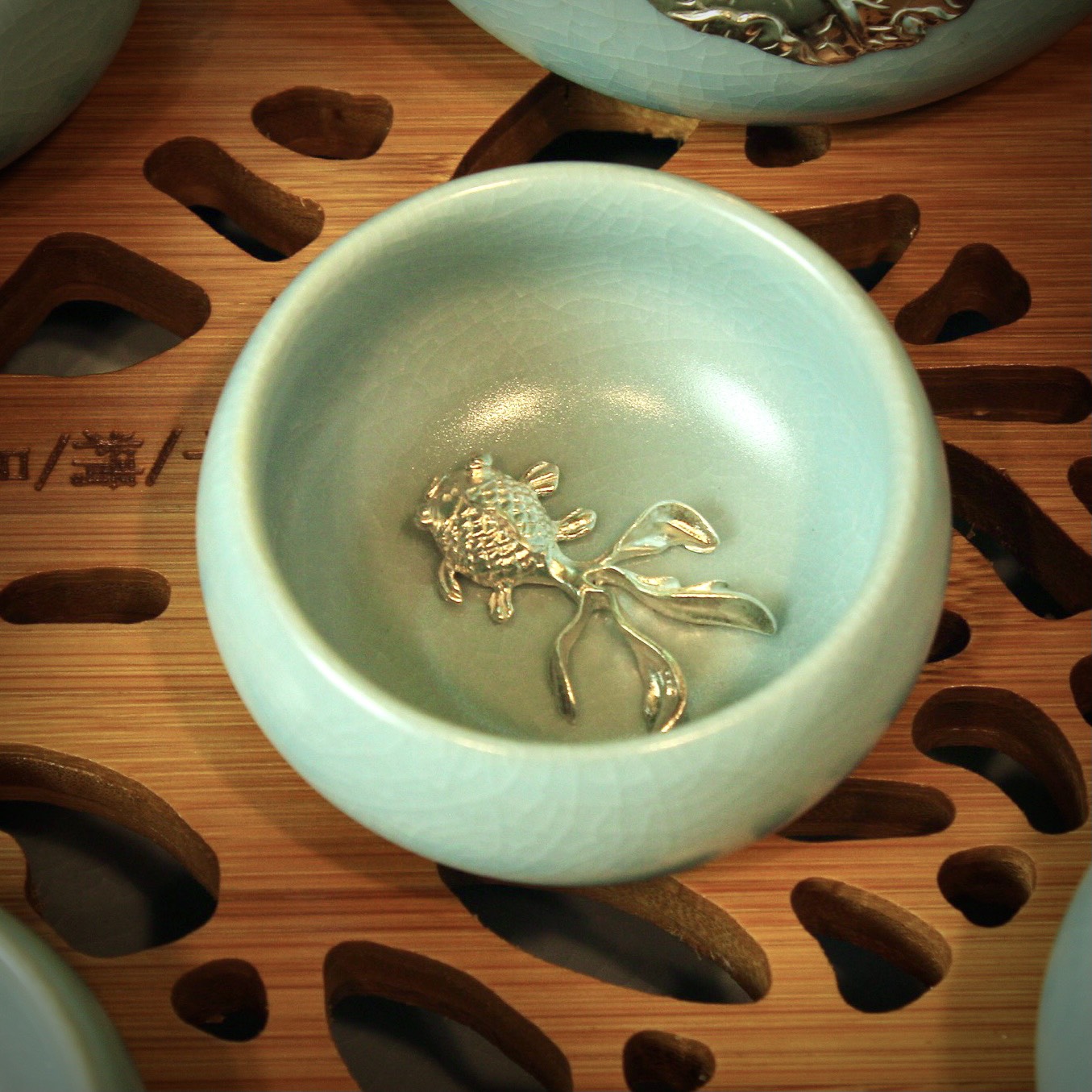 Bộ Ấm Chén Sứ Lõi Bạc 999