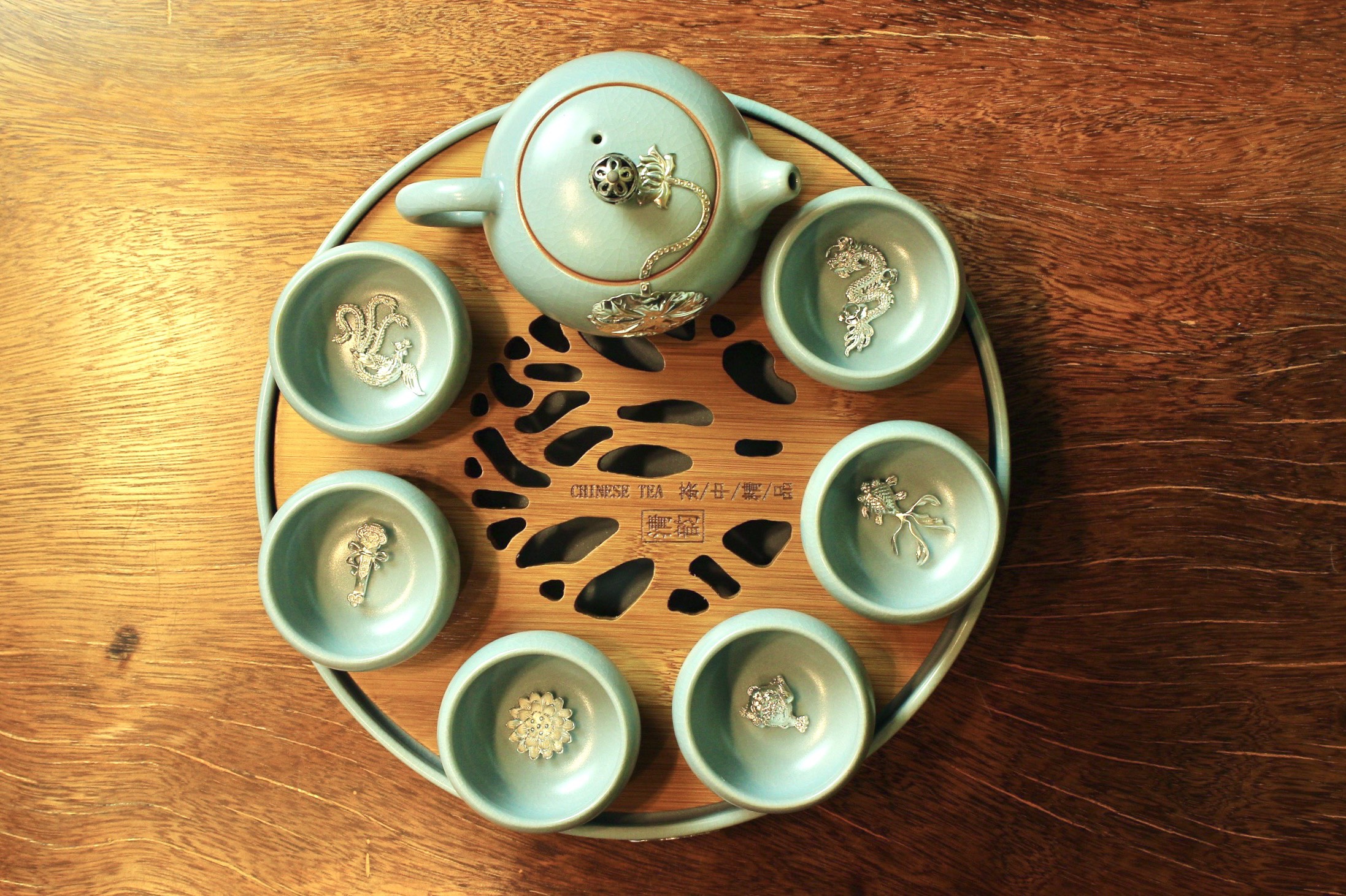 Bộ Ấm Chén Sứ Lõi Bạc 999