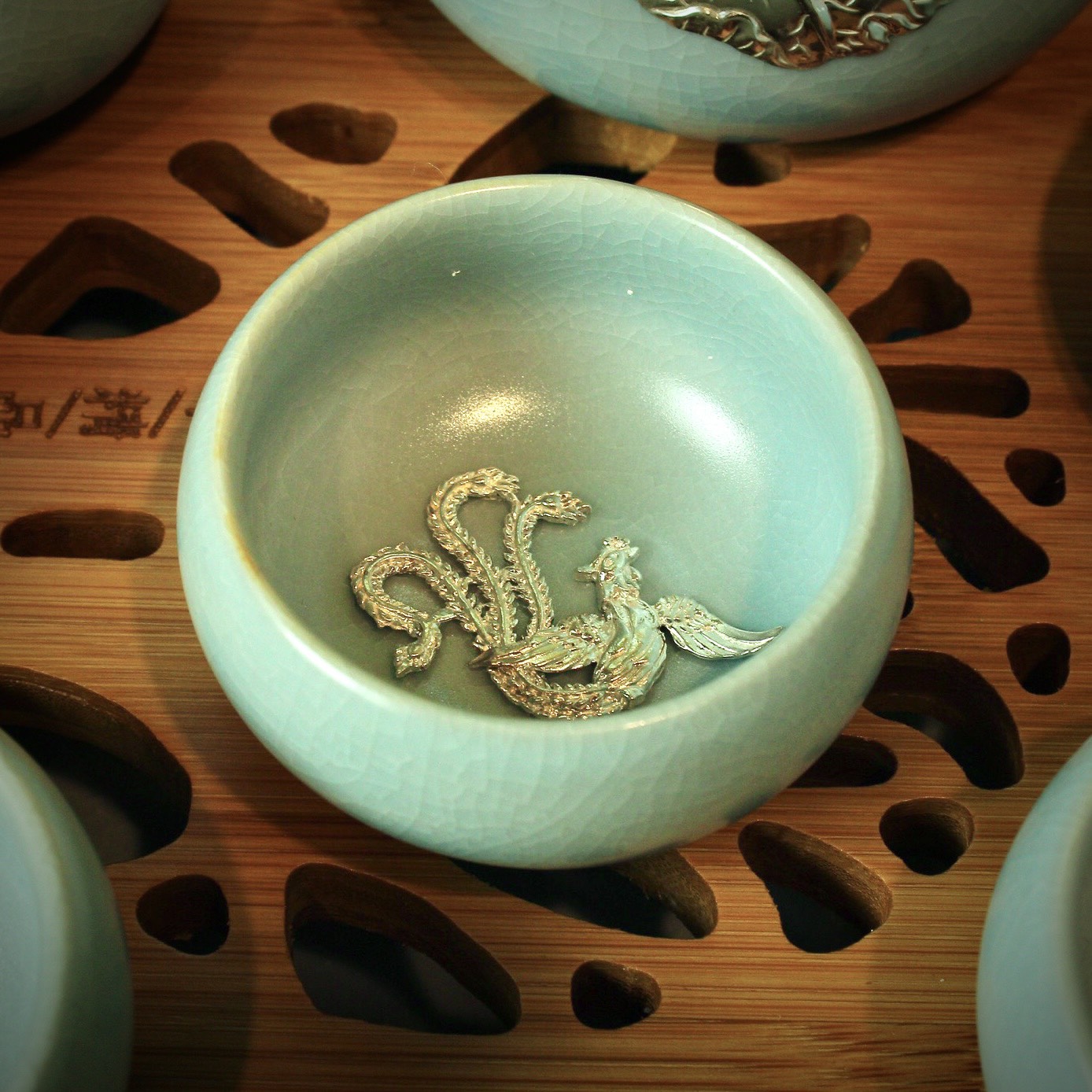 Bộ Ấm Chén Sứ Lõi Bạc 999