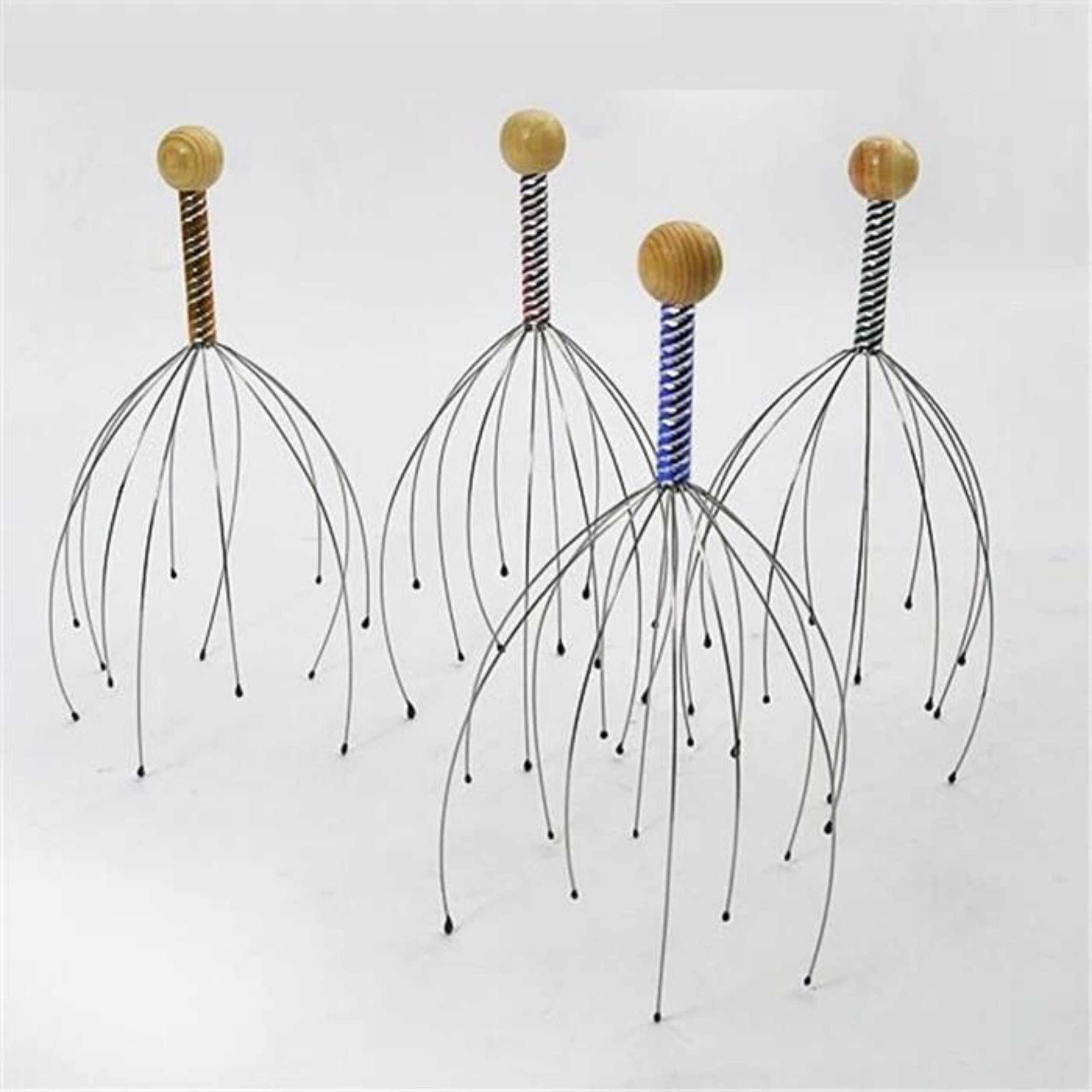 DỤNG CỤC MASSAGE ĐẦU HÌNH BẠCH TUỘT