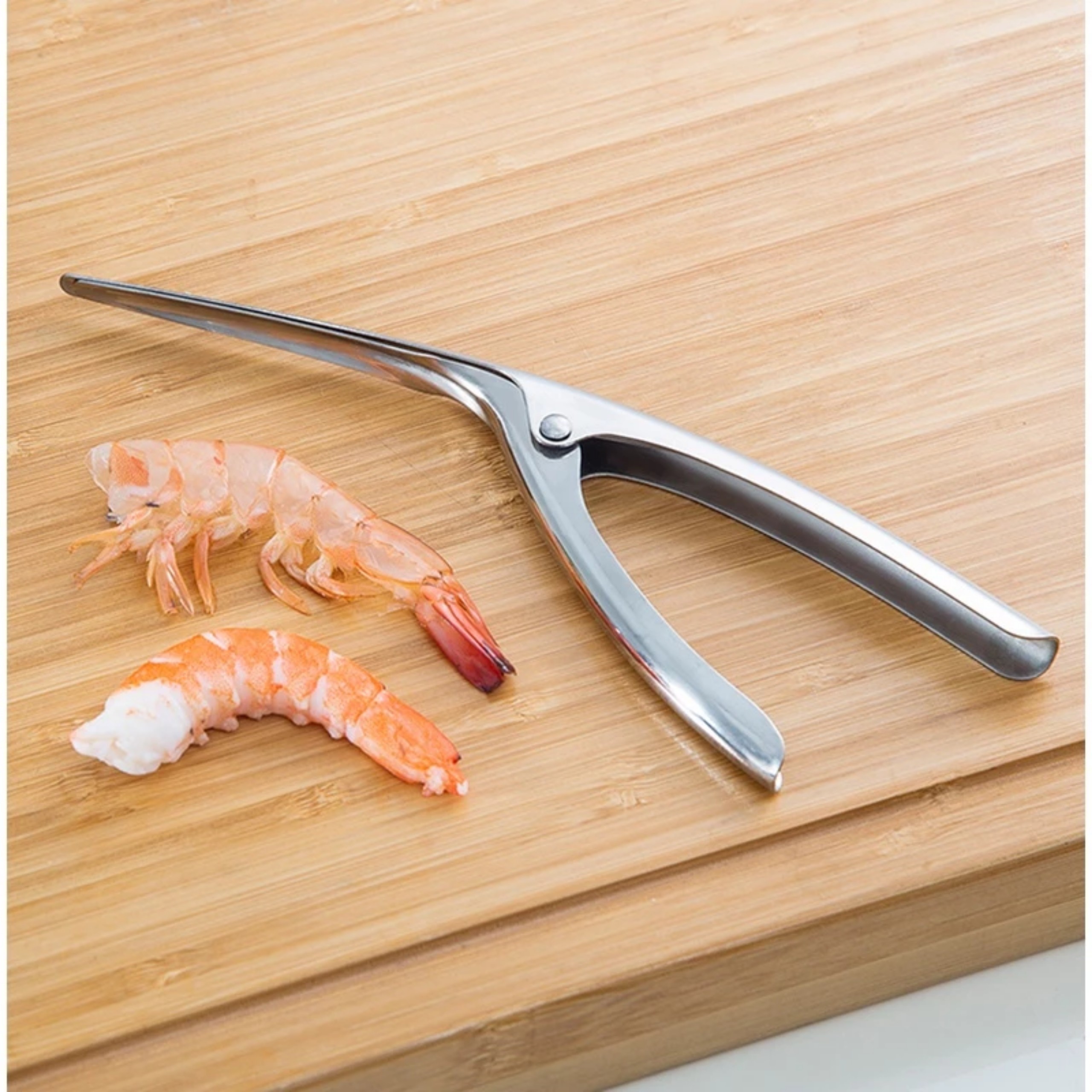 DỤNG CỤ TÁCH VỎ TÔM