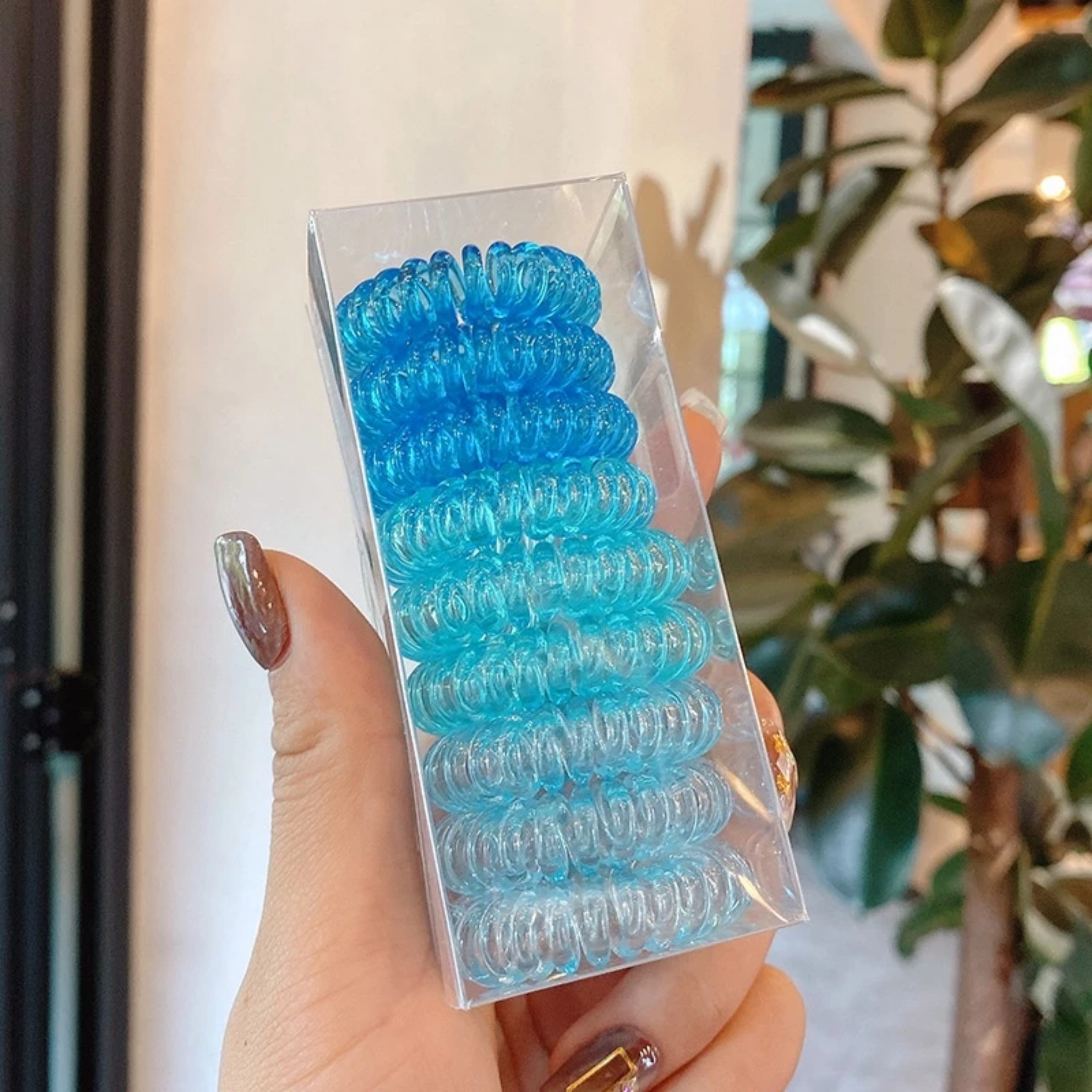 HỘP CỘT TÓC LÒ XO 9 CÁI