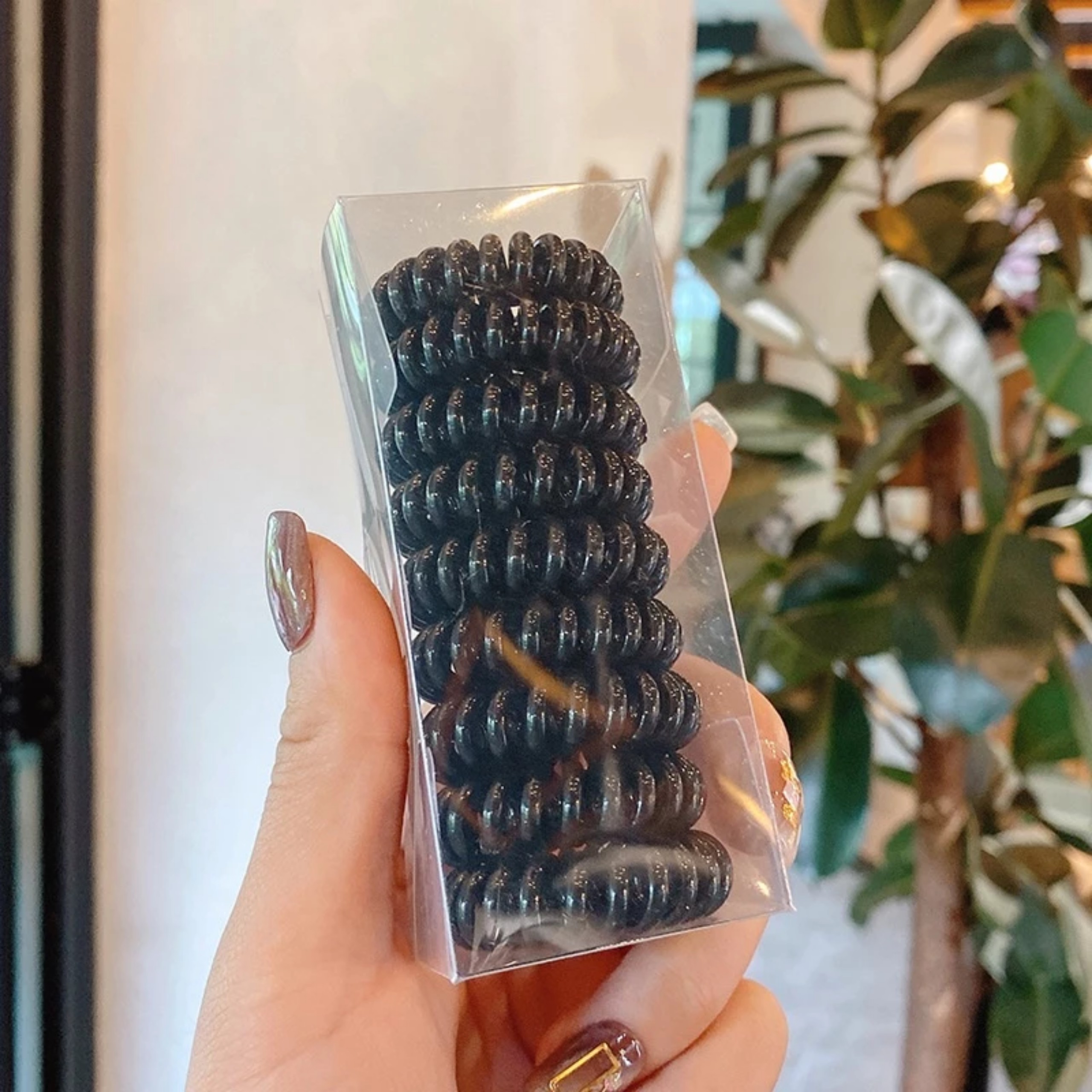 HỘP CỘT TÓC LÒ XO 9 CÁI