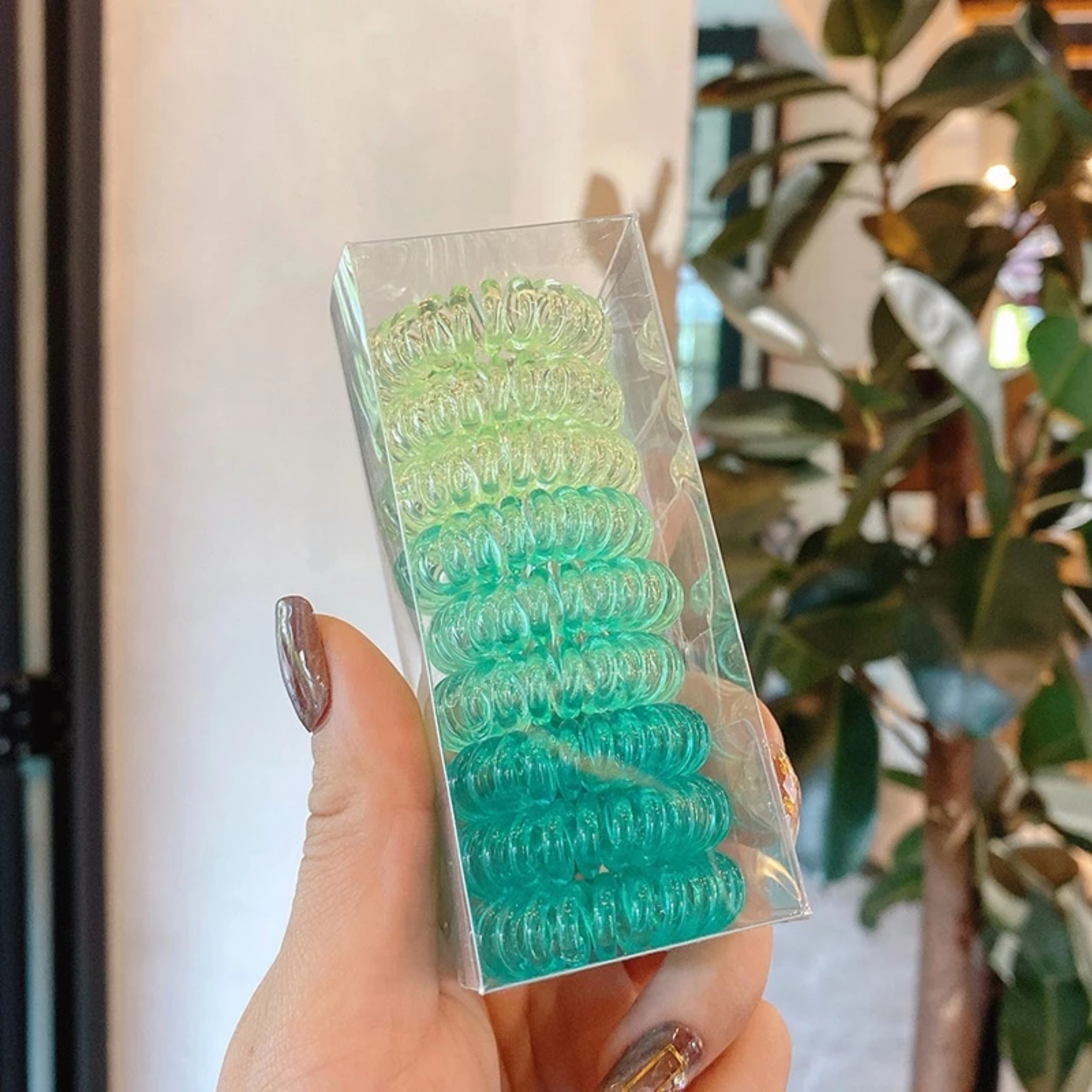 HỘP CỘT TÓC LÒ XO 9 CÁI