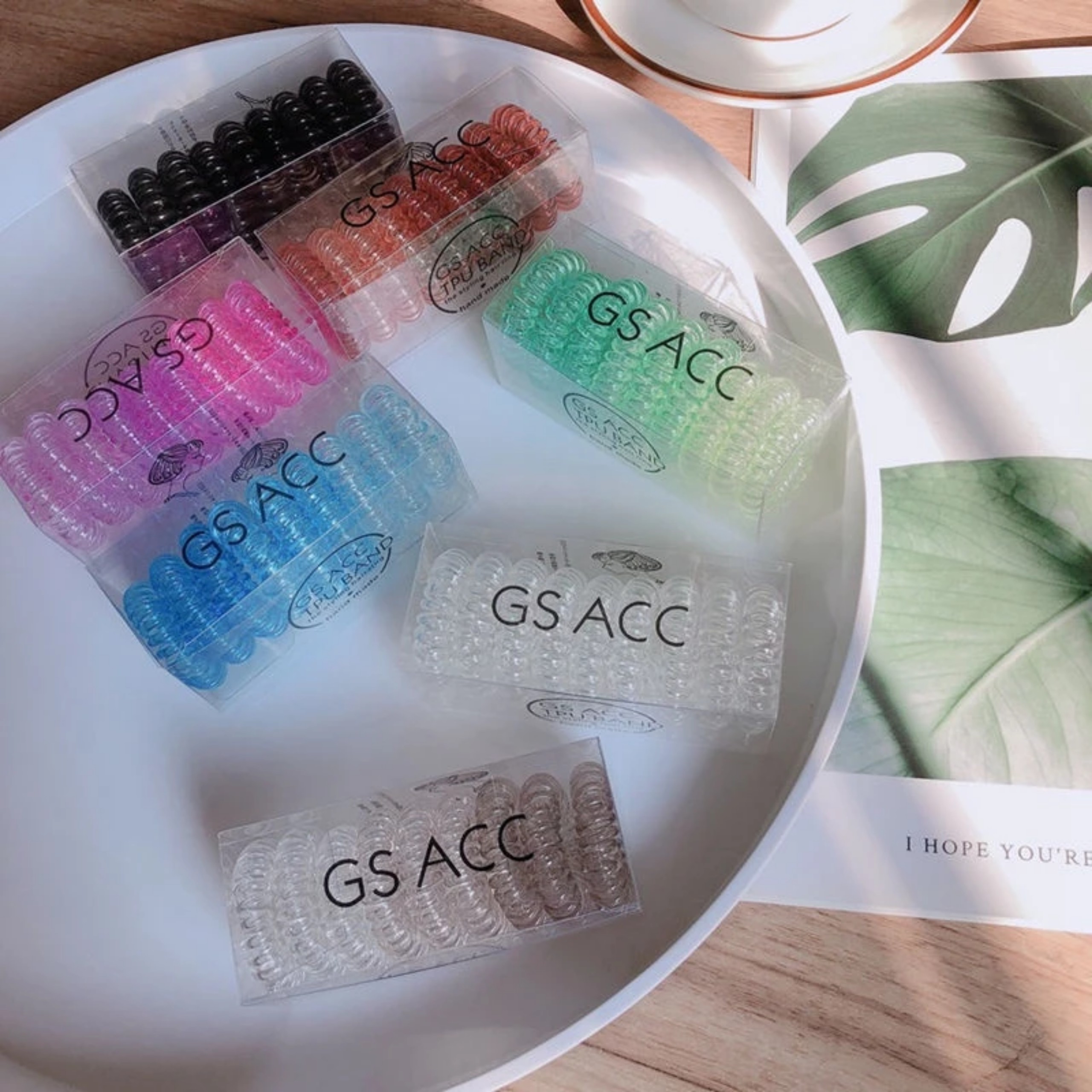 HỘP CỘT TÓC LÒ XO 9 CÁI