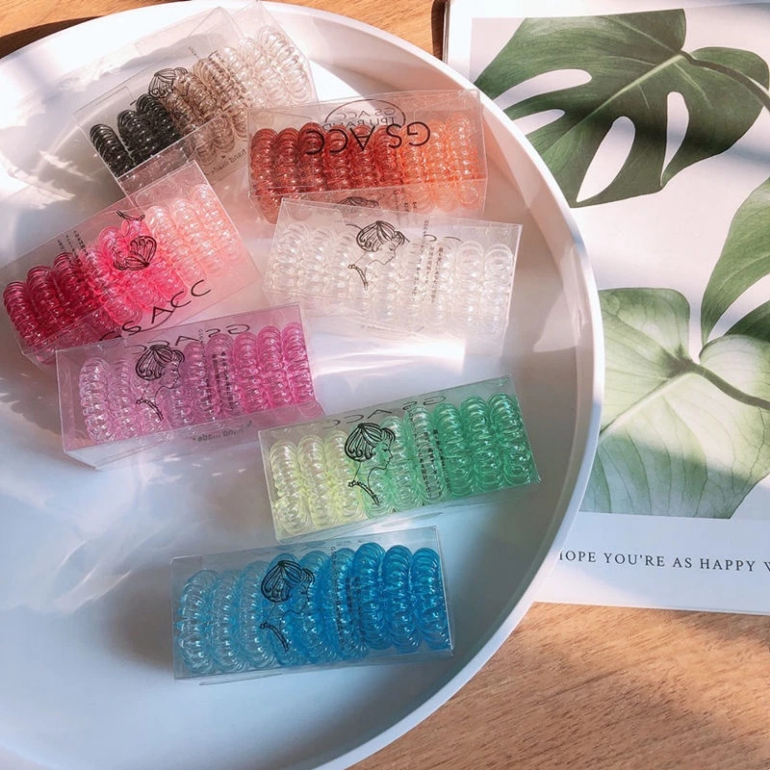 HỘP CỘT TÓC LÒ XO 9 CÁI