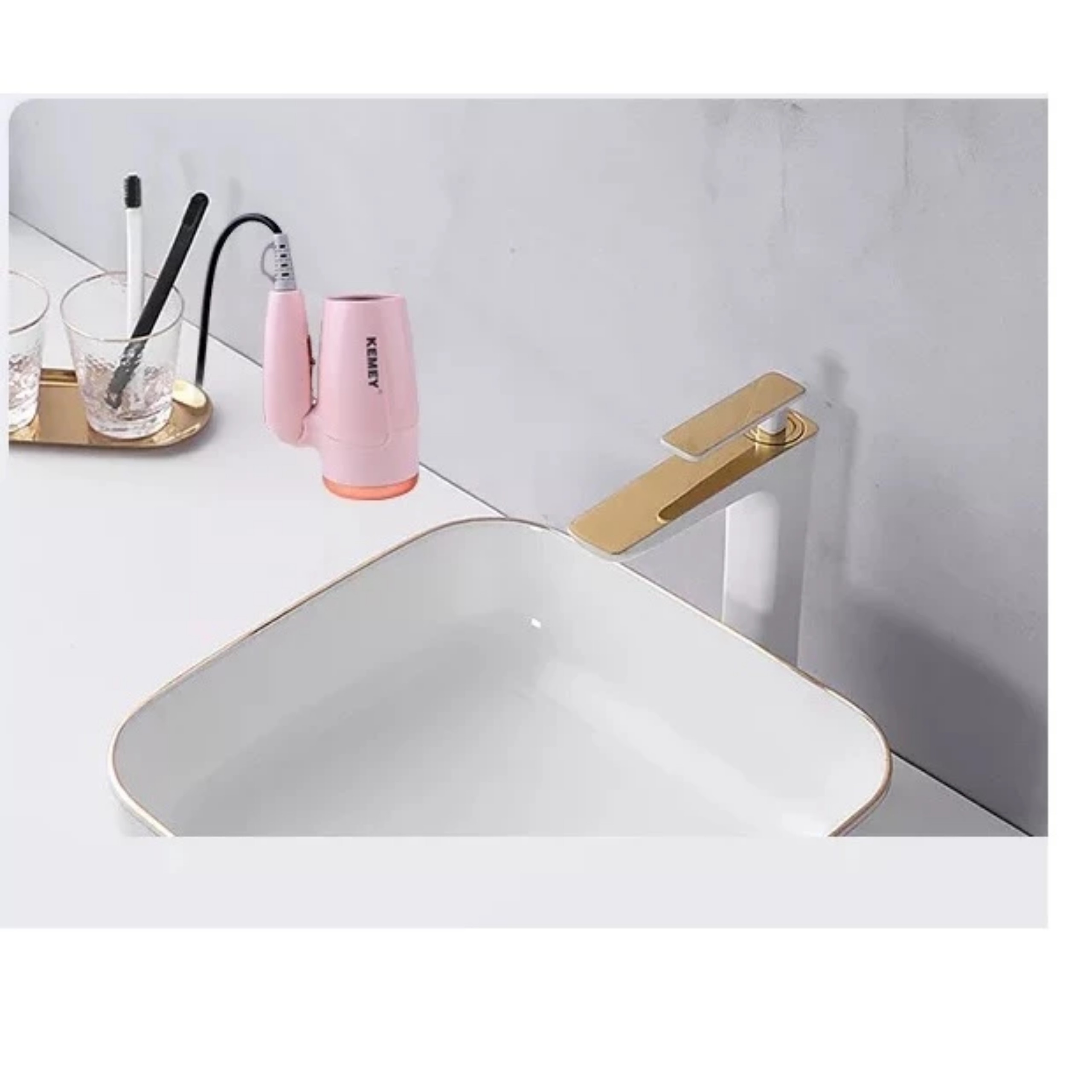 MÁY SẤY TÓC KEMEY MÀU HỒNG