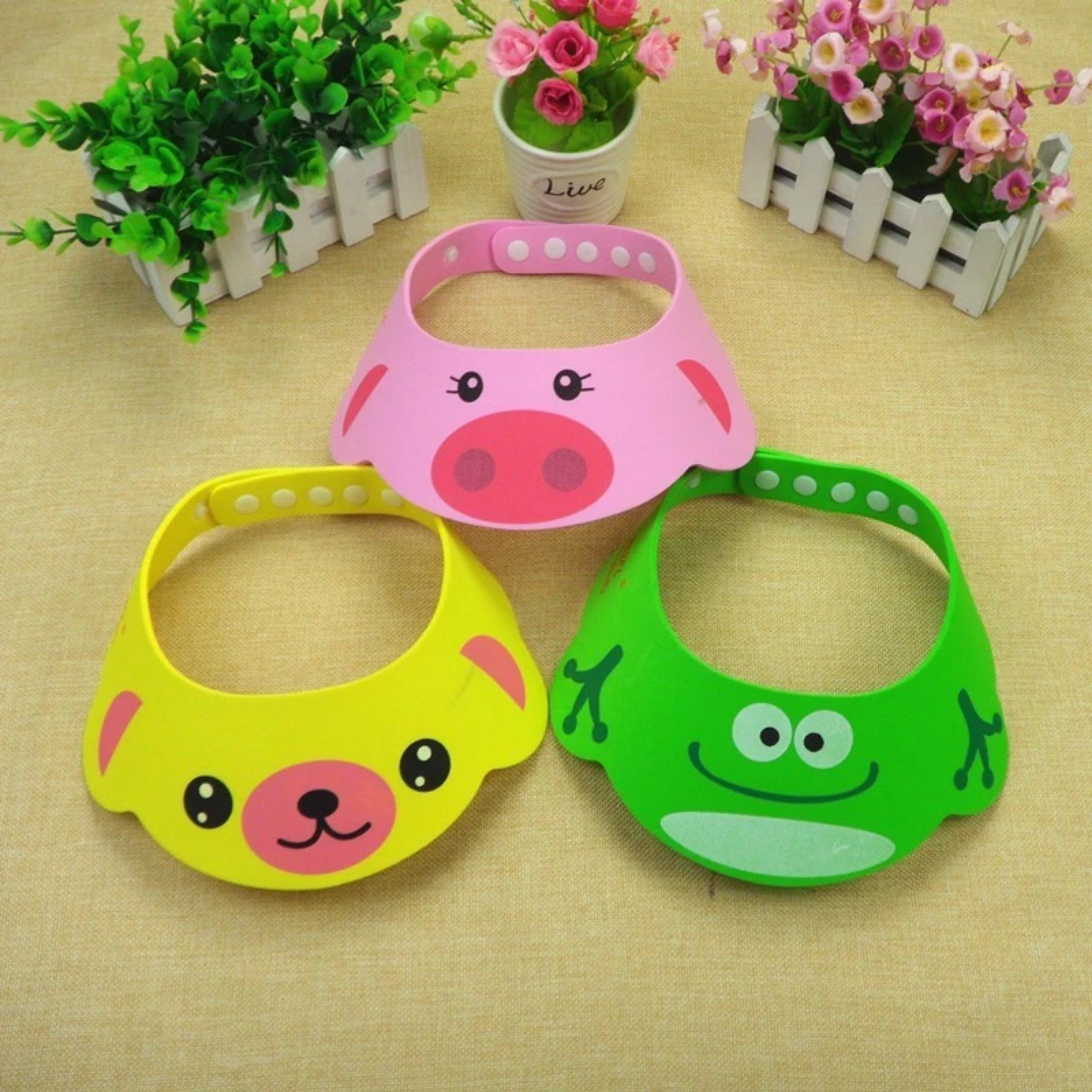 NÓN TẮM ĐỘI ĐẦU CHĂN NƯỚC CHO BÉ