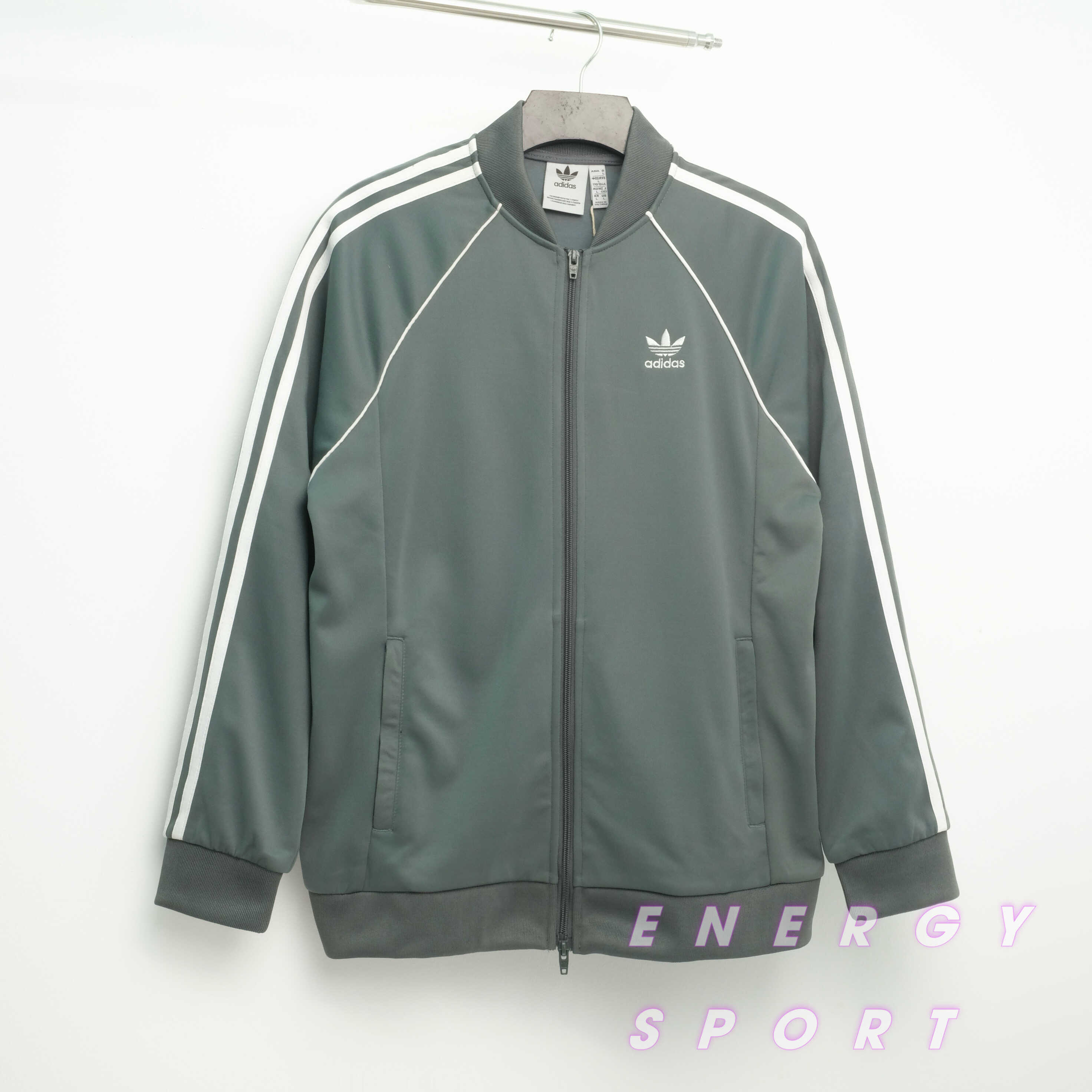 Bộ Quần Áo Thể Thao Unisex Nam Nữ Adidas Adicolor Classic Primeblue SST Track - Màu Xi Măng
