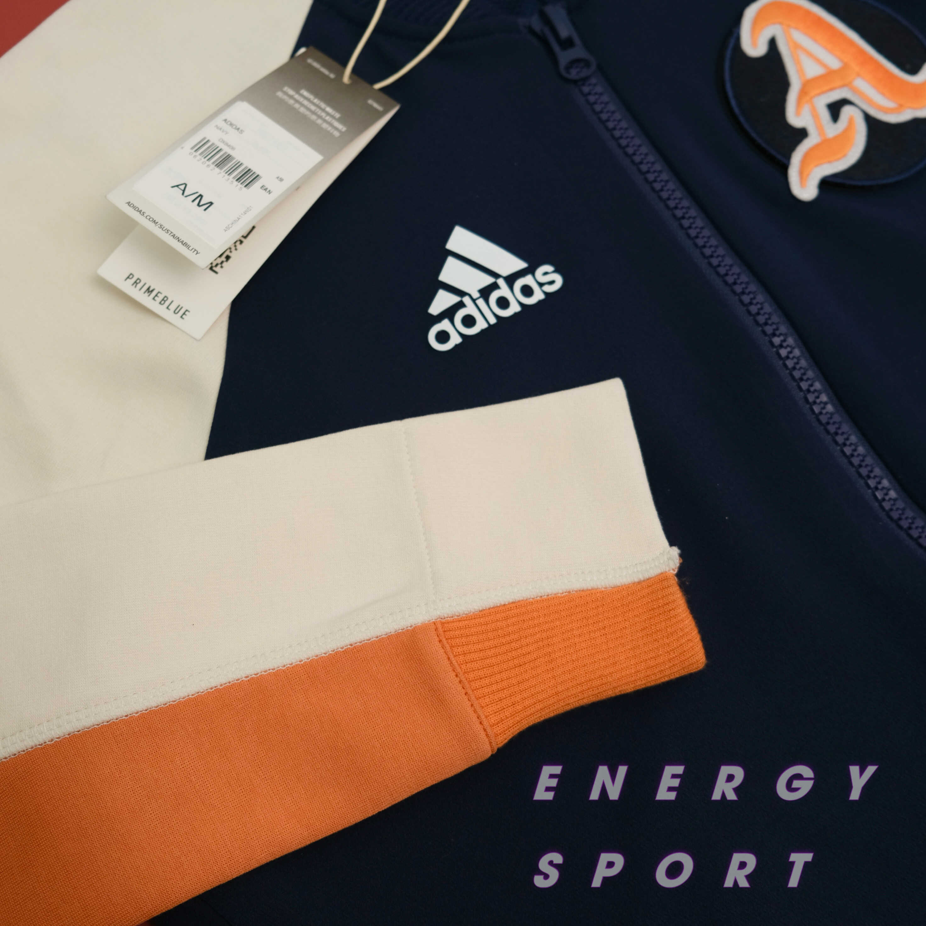 Áo Khoác Bomber Thể Thao Unisex Adidas VRCT Jacket Kem/Navy - DX8408