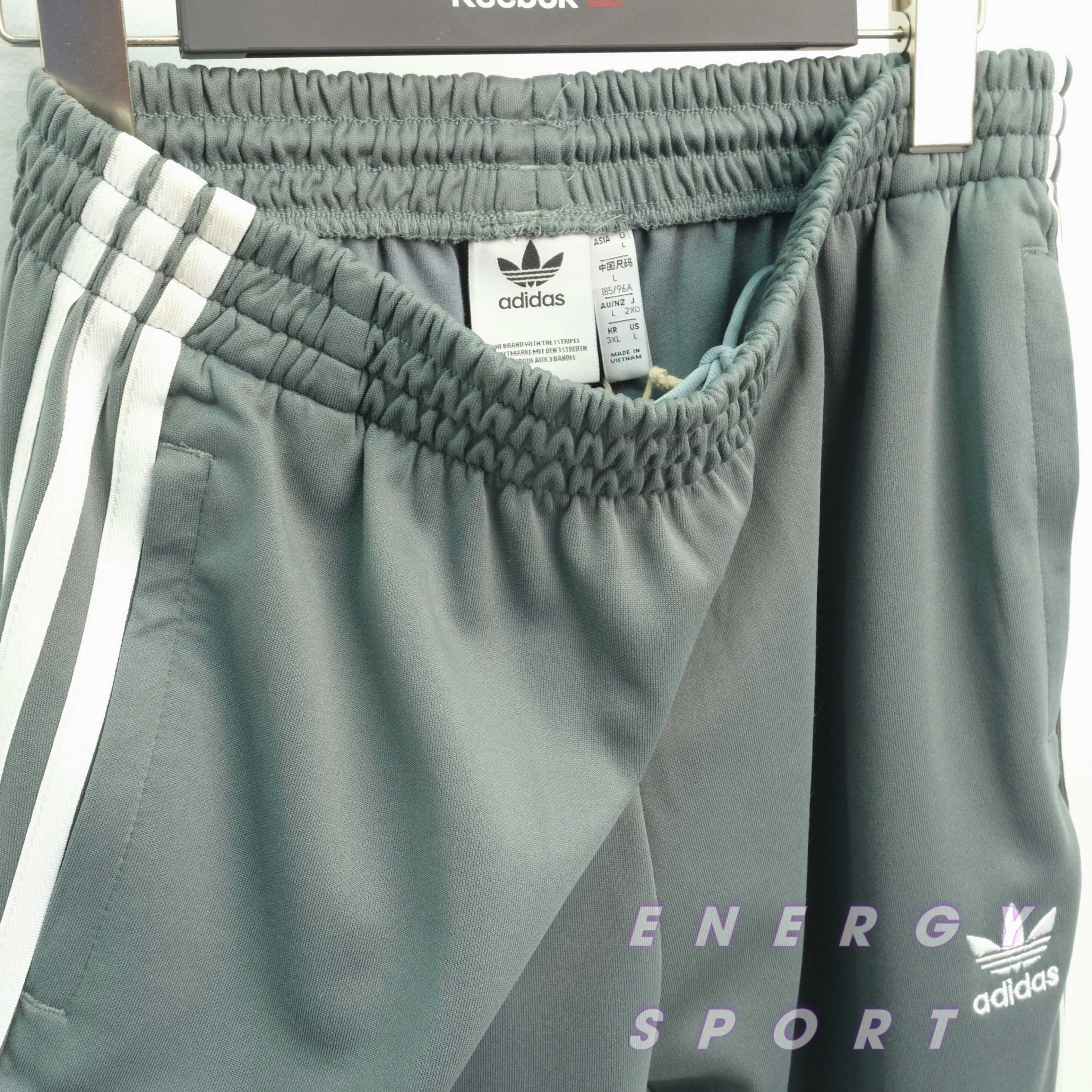 Bộ Quần Áo Thể Thao Unisex Nam Nữ Adidas Adicolor Classic Primeblue SST Track - Màu Xi Măng
