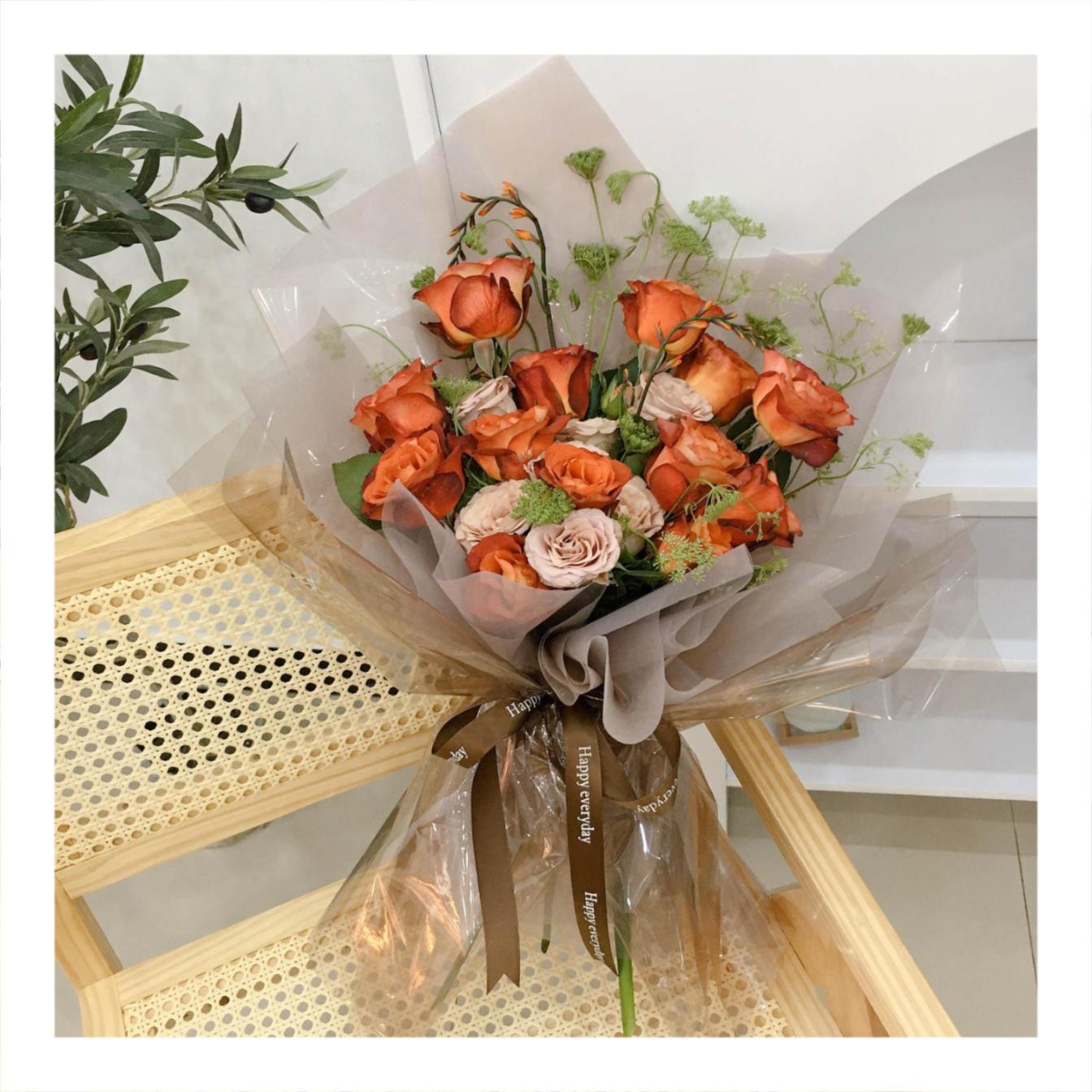 Bó hoa tươi tone cam