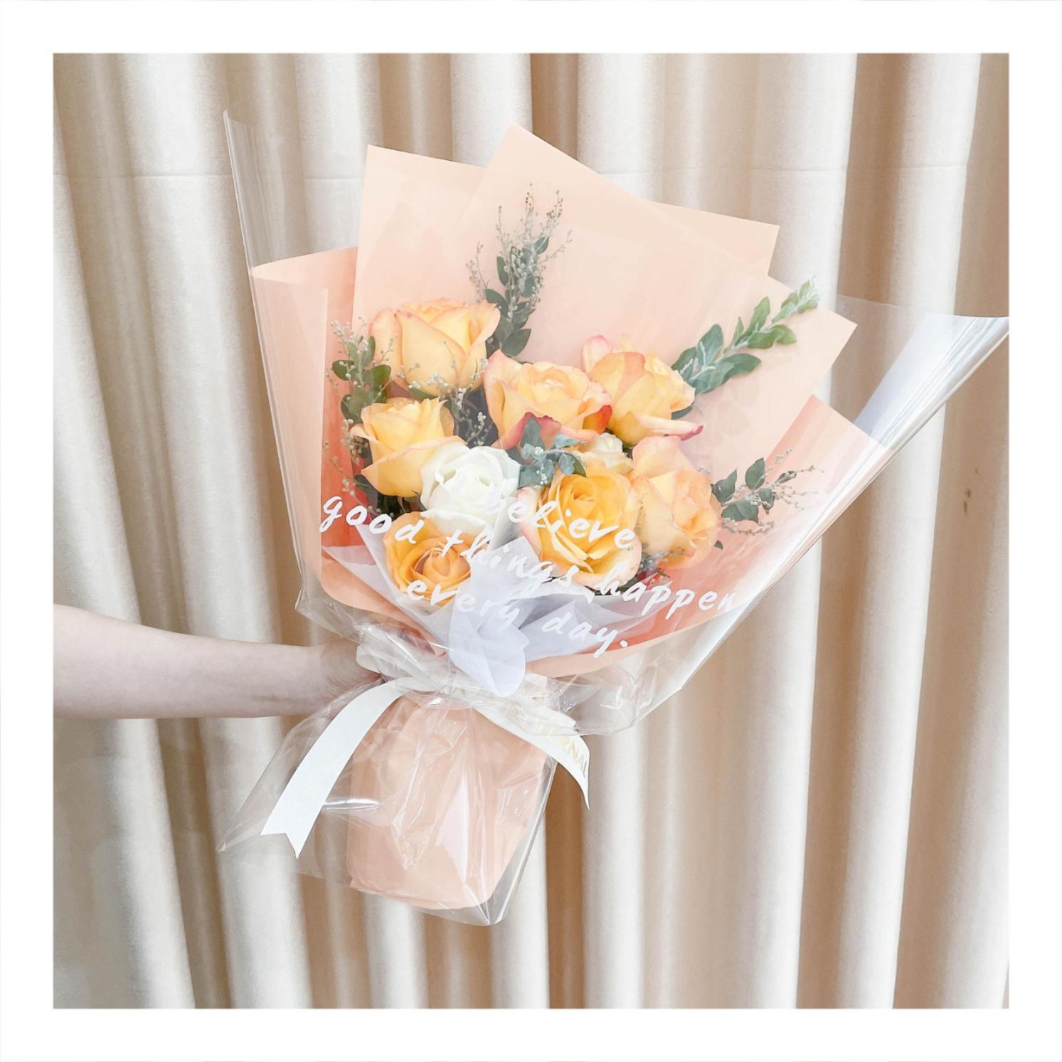 Bó hoa tươi tone cam