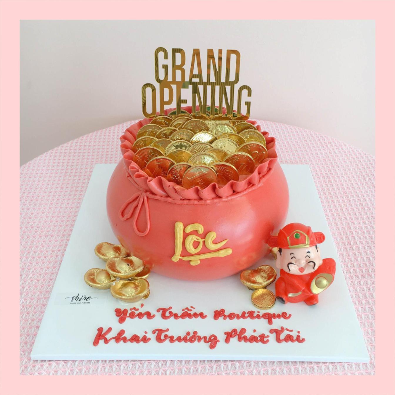 Bánh kem khai trương hình hũ vàng, túi vàng