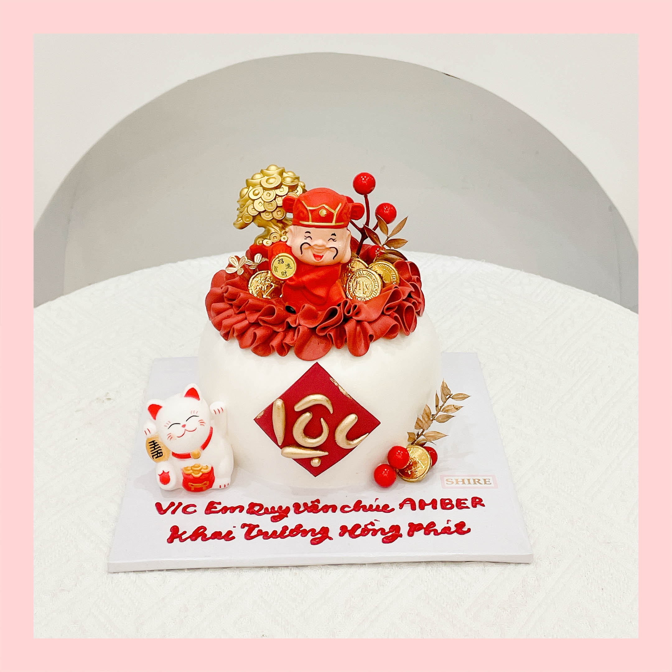 Bánh kem khai trương hình hũ vàng, túi vàng