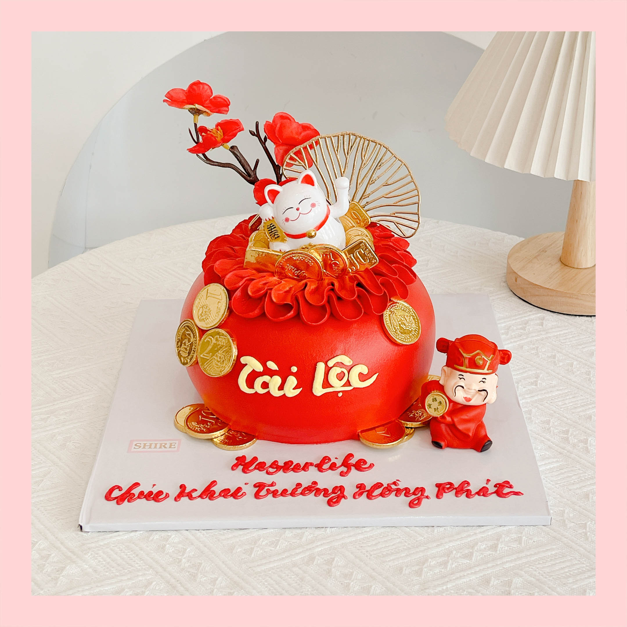 Bánh kem khai trương hình hũ vàng, túi vàng