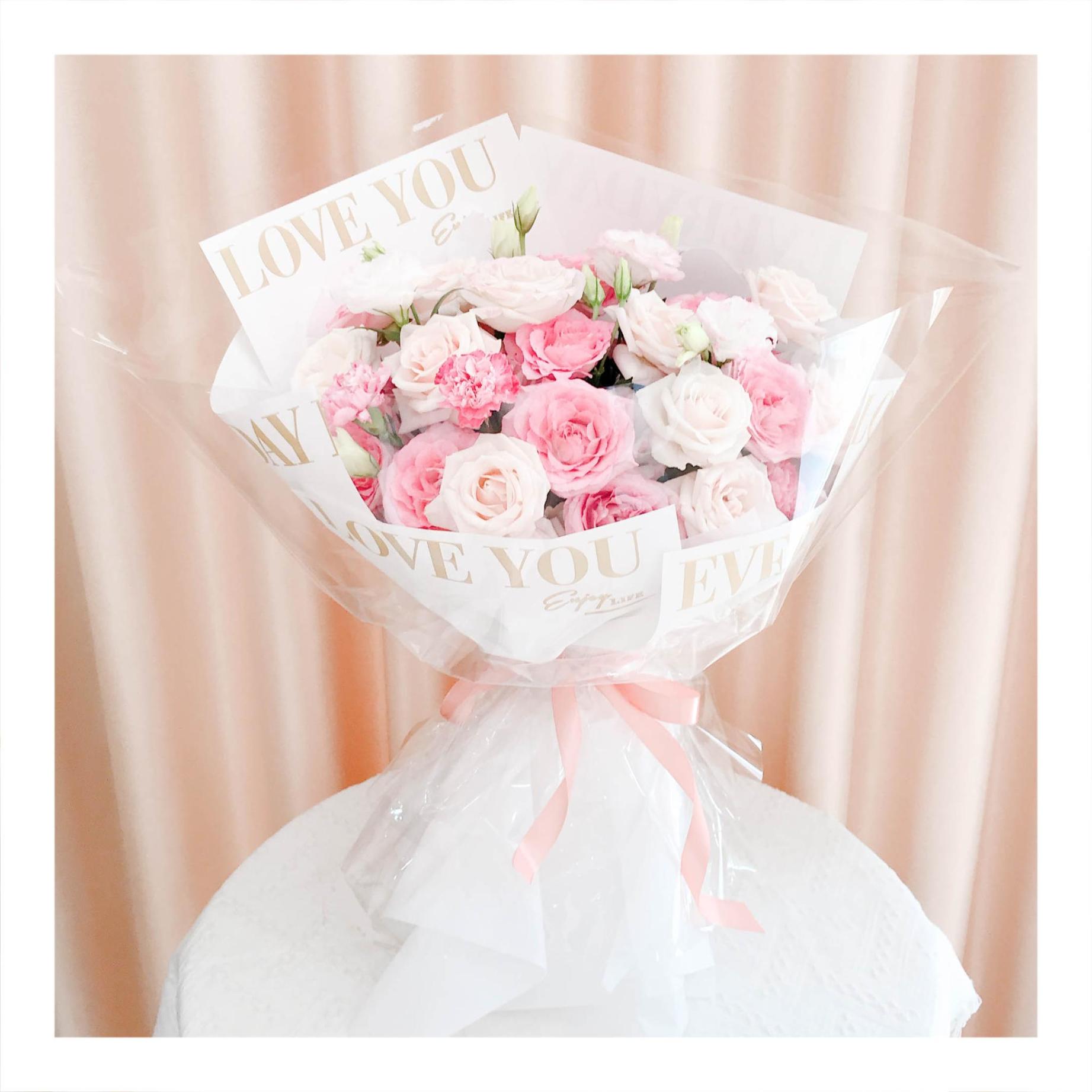 Bó hoa tươi tone hồng mix