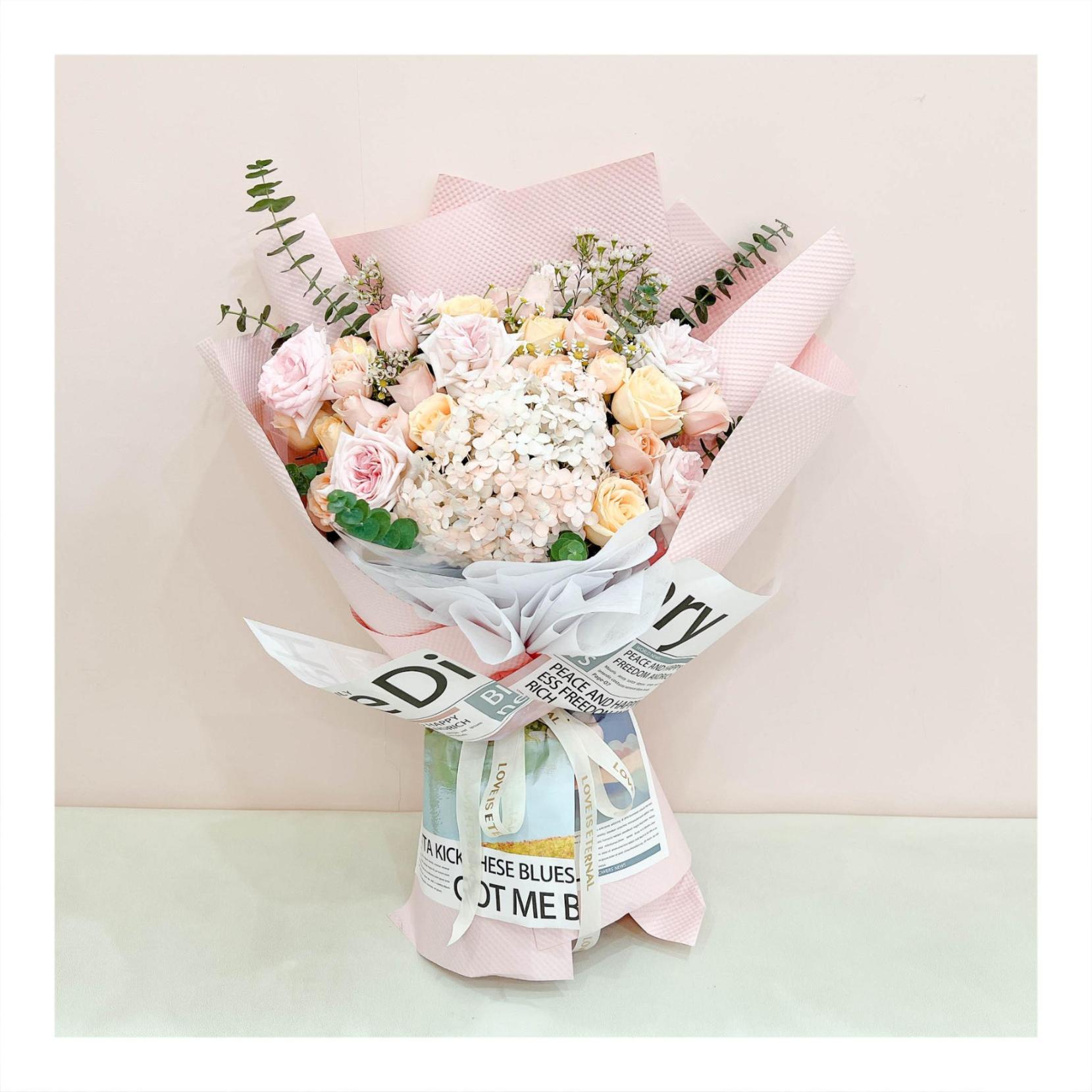 Bó hoa tươi tone cam