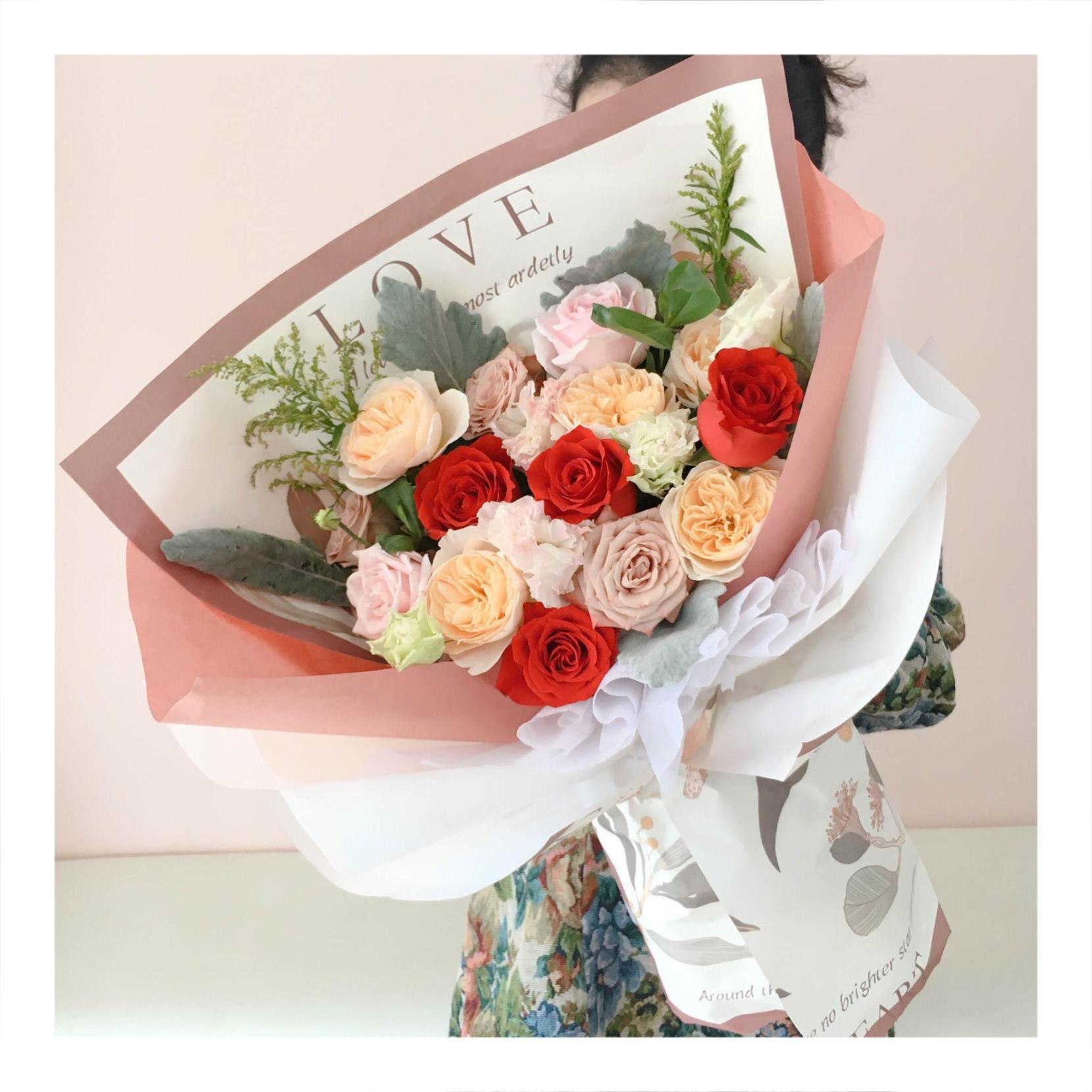 Bó hoa tươi tone cam