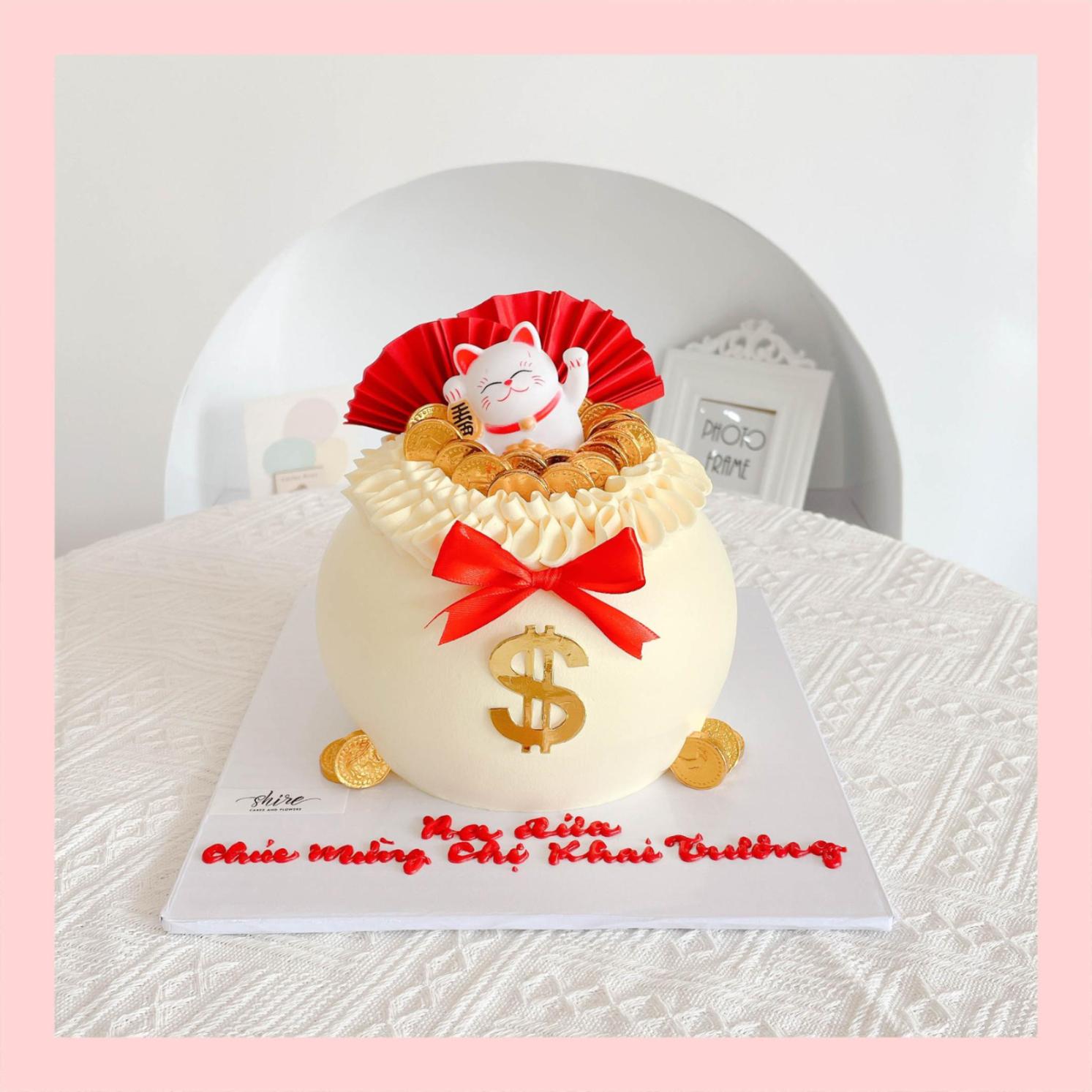 Bánh kem khai trương hình hũ vàng, túi vàng
