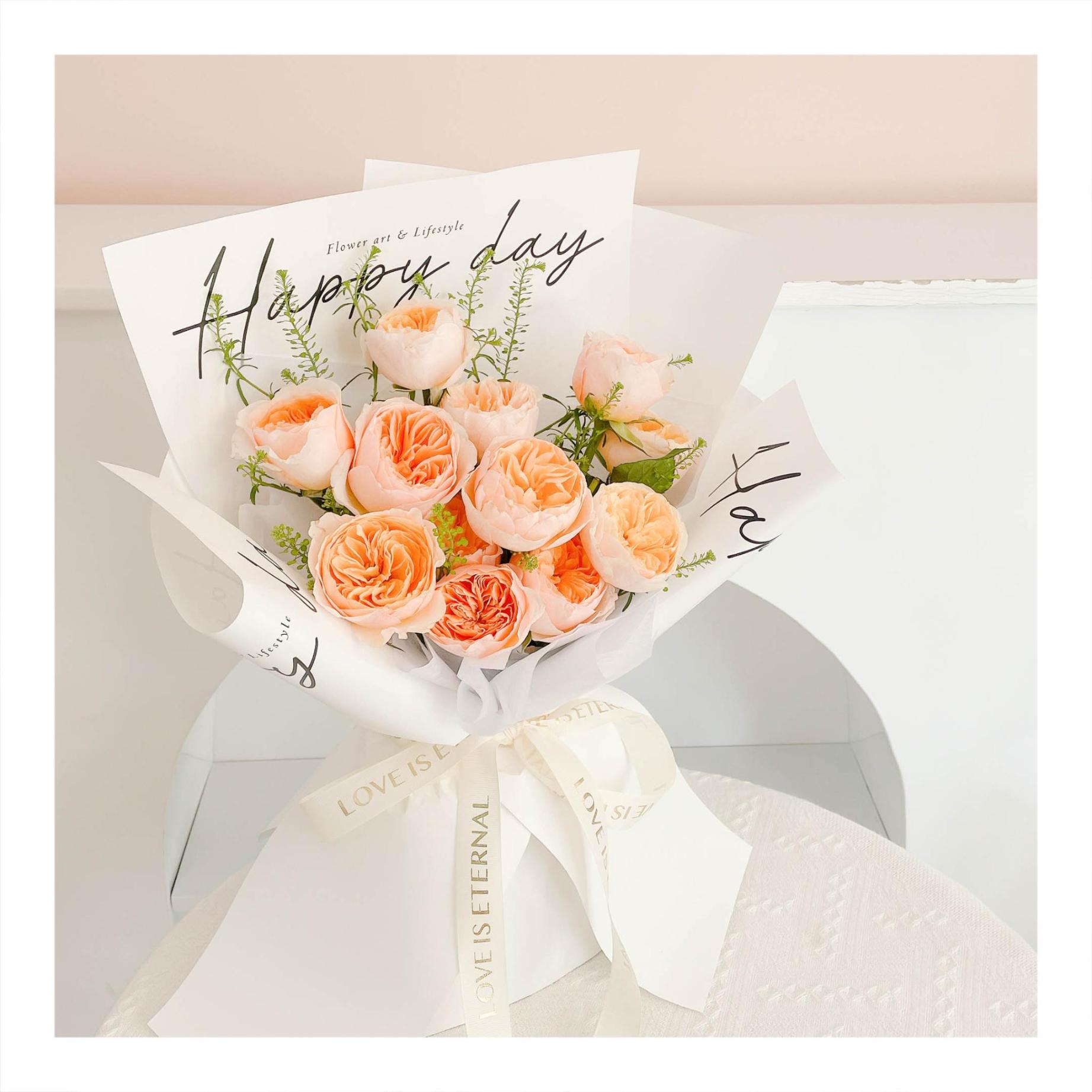 Bó hoa tươi tone cam