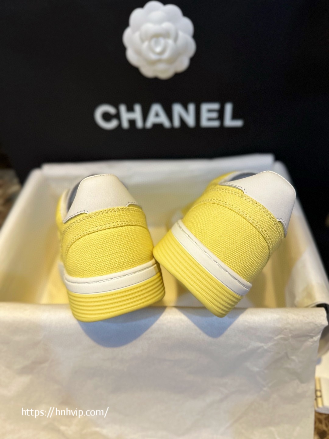 Chanel white and yellow sneakers