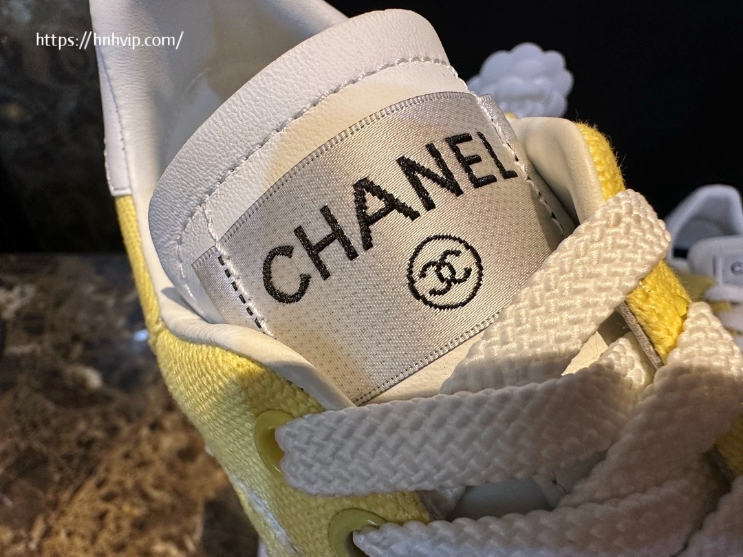 Chanel white and yellow sneakers