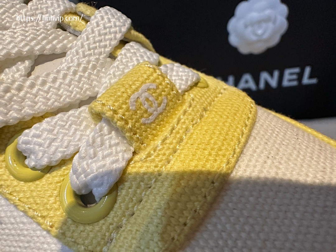 Chanel white and yellow sneakers
