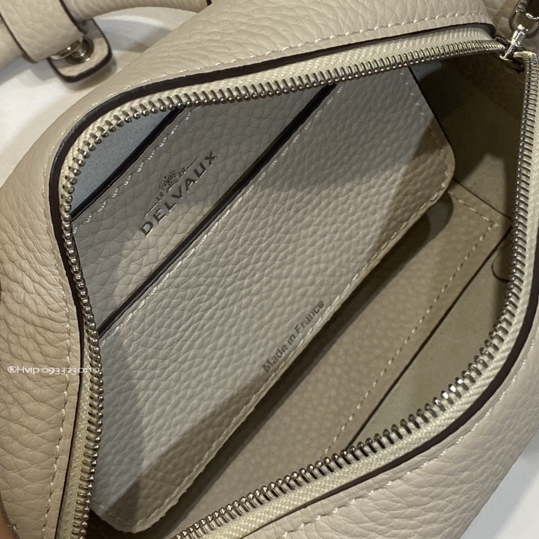 Delvaux Cool Box Nano in Taurillon Soft AA0669AQY Sesame