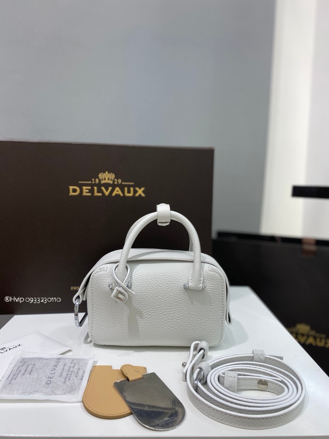 Delvaux Cool Box Nano in Taurillon Soft AA0669AQY white