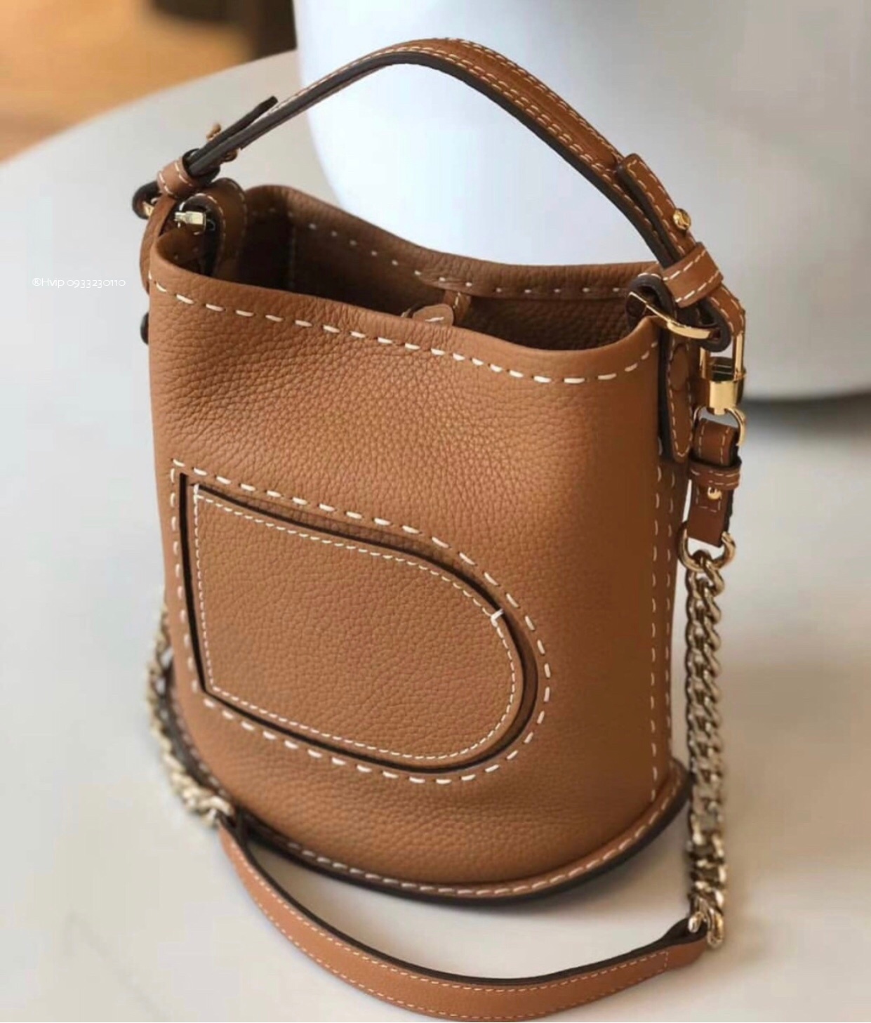 Delvaux Pin Mini Bucket Surpiquéen Taurillon Soft AA0607ATT0ADNDO Vegetal - Ivory