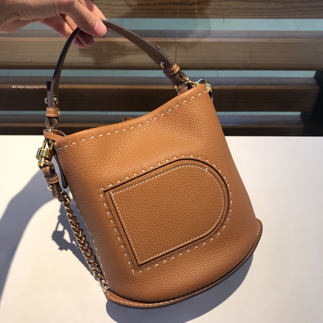 Delvaux Pin Mini Bucket Surpiquéen Taurillon Soft AA0607ATT0ADNDO Vegetal - Ivory