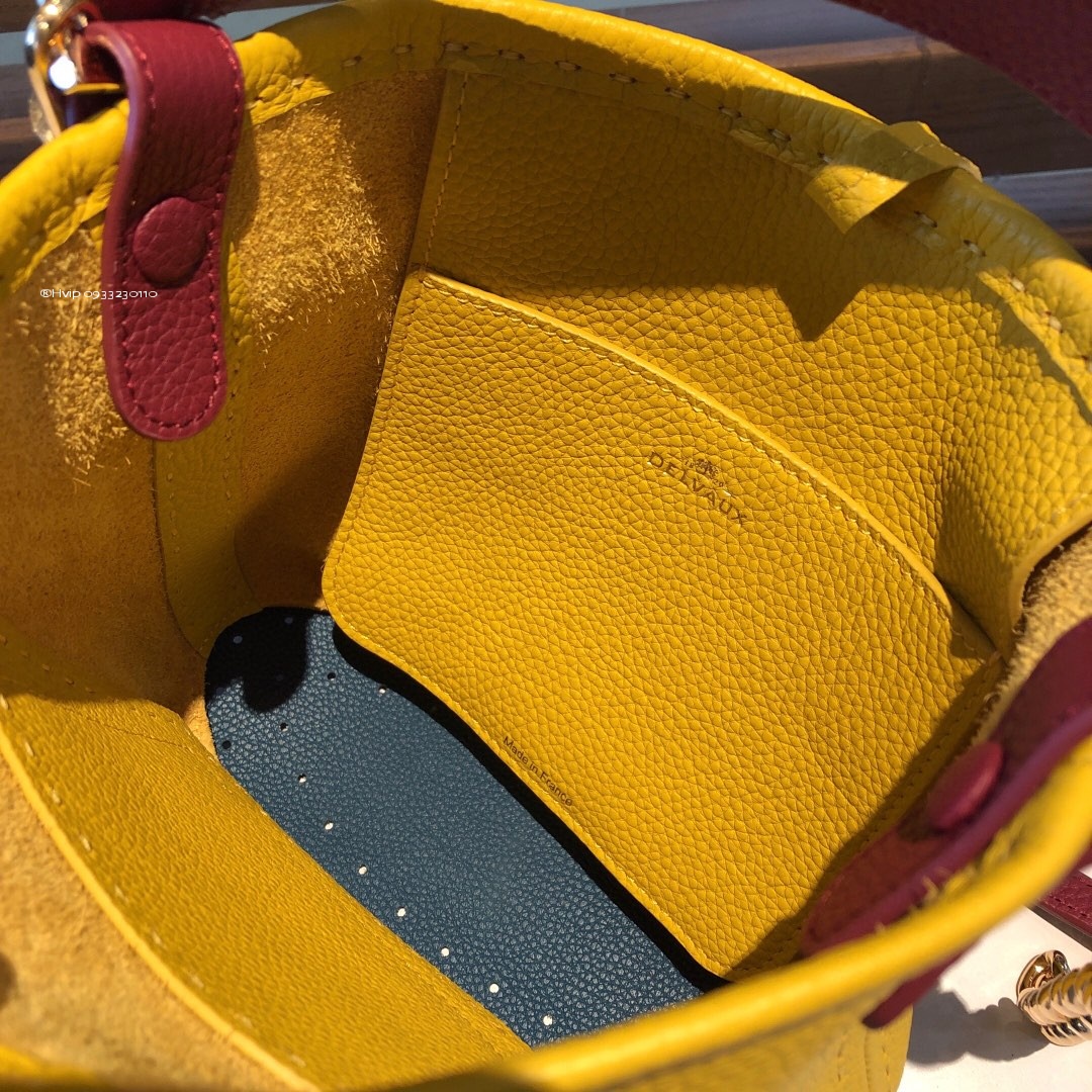 Delvaux Pin Mini Bucket Surpiquéen Taurillon Soft AA0607ATT0ADNDO yellow