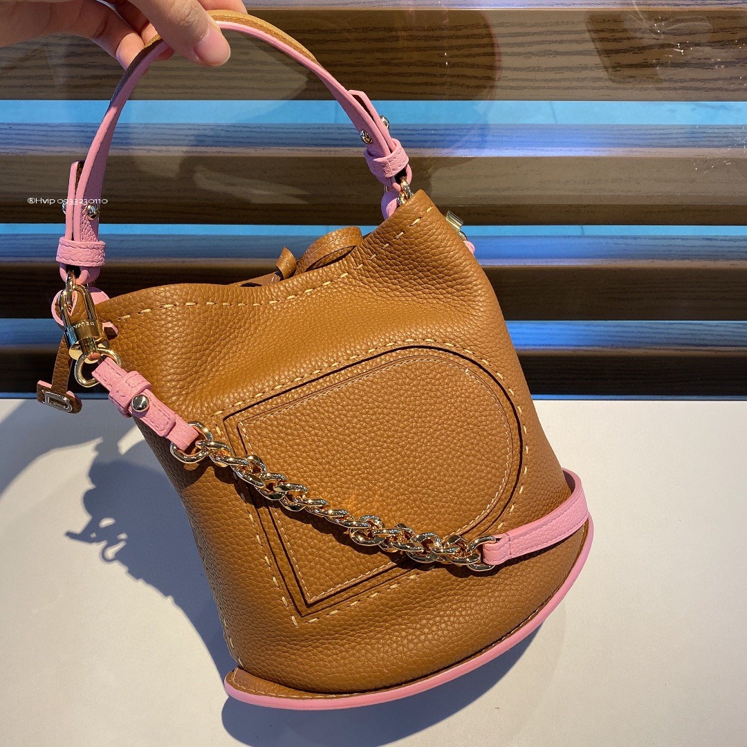 Delvaux Pin Mini Bucket Surpiquéen Taurillon Soft AA0607ATT0ADNDO gold /pink