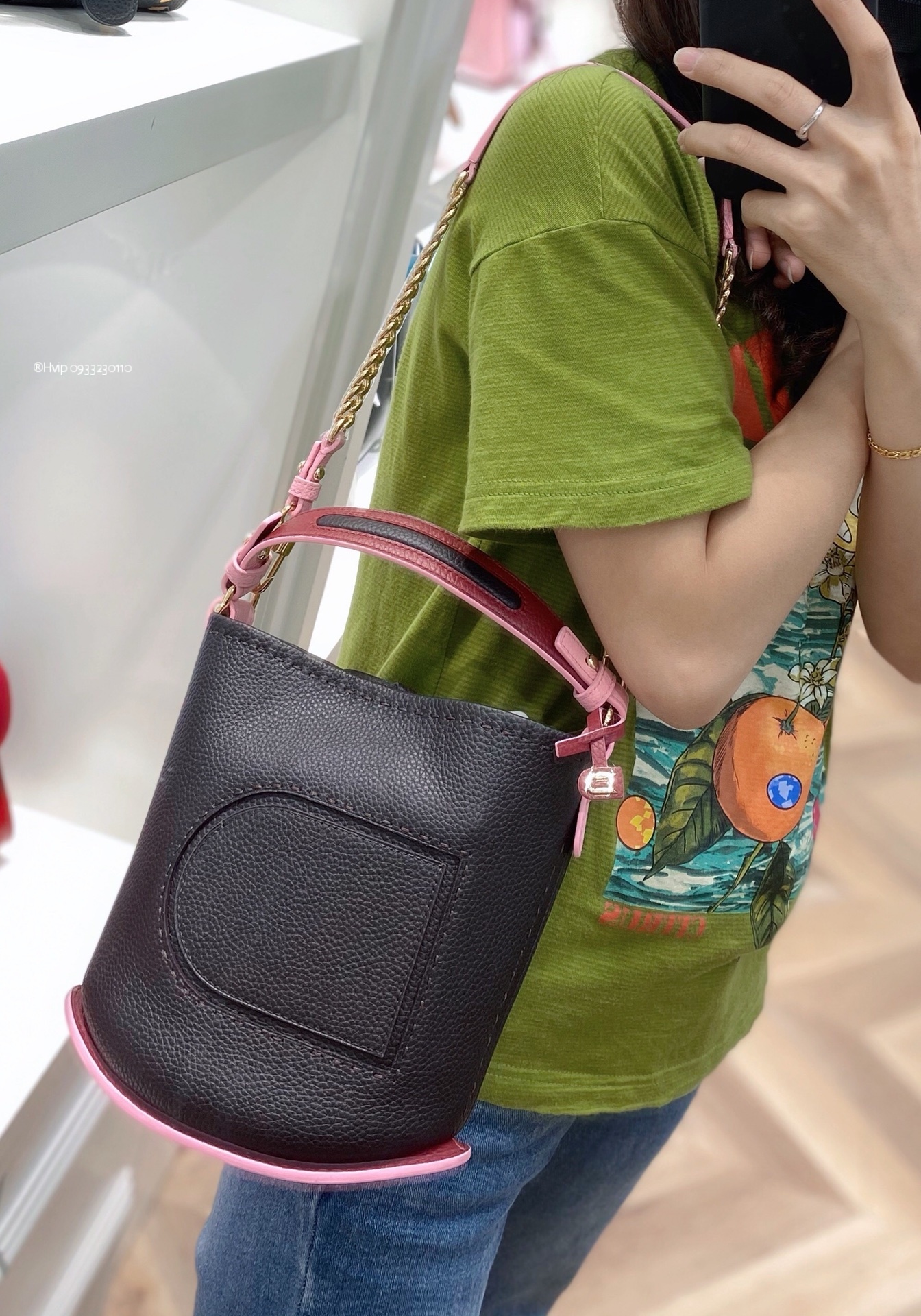 Delvaux Pin Mini Bucket Surpiquéen Taurillon Soft AA0607ATT0ADNDO black/pink