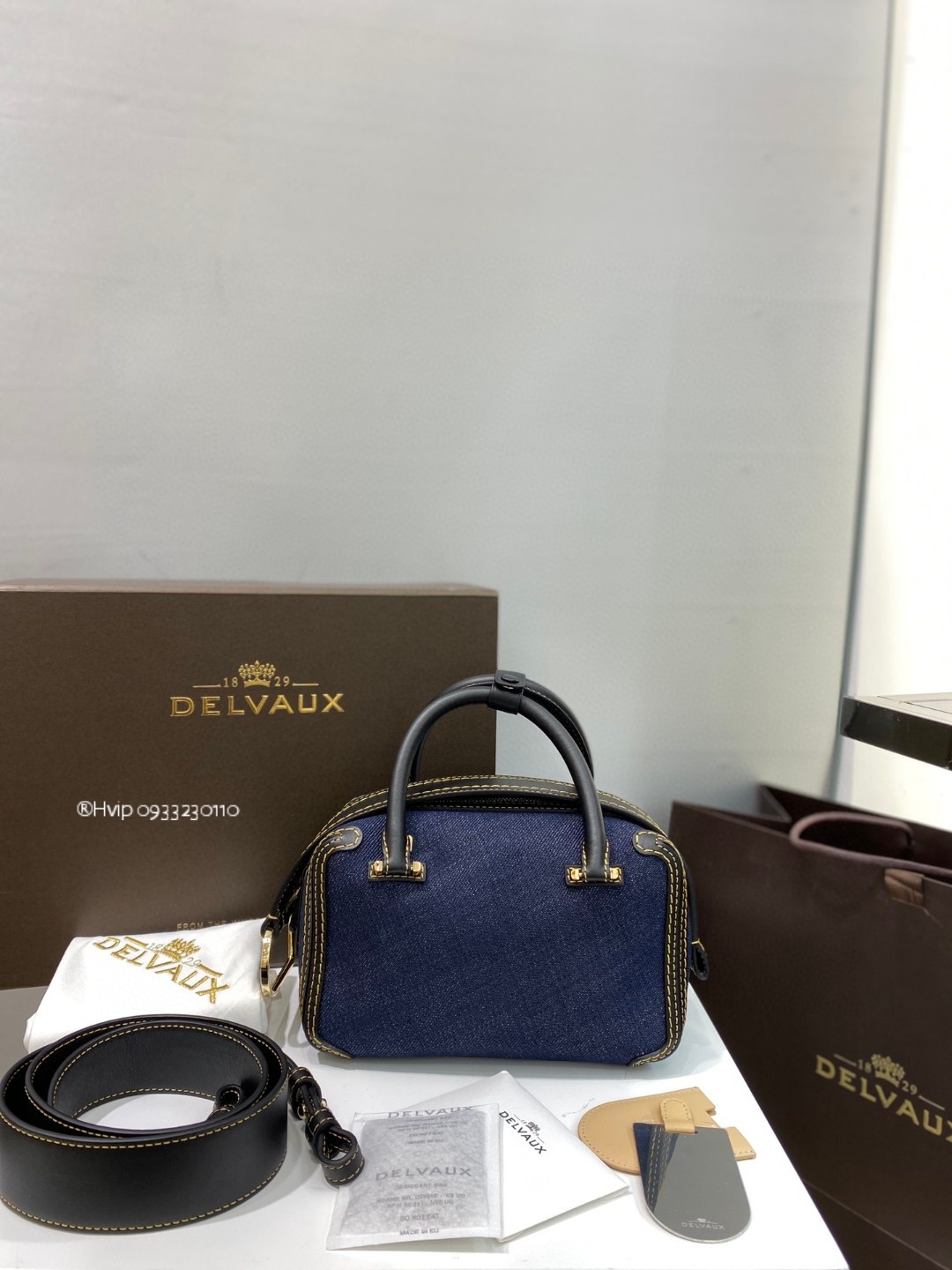 Delvaux Cool Box Nano in denim blue