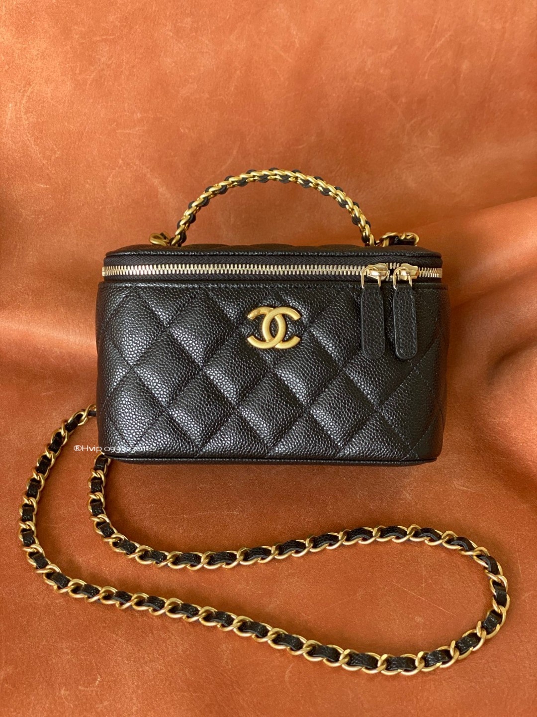 Chanel flap bag with top handle