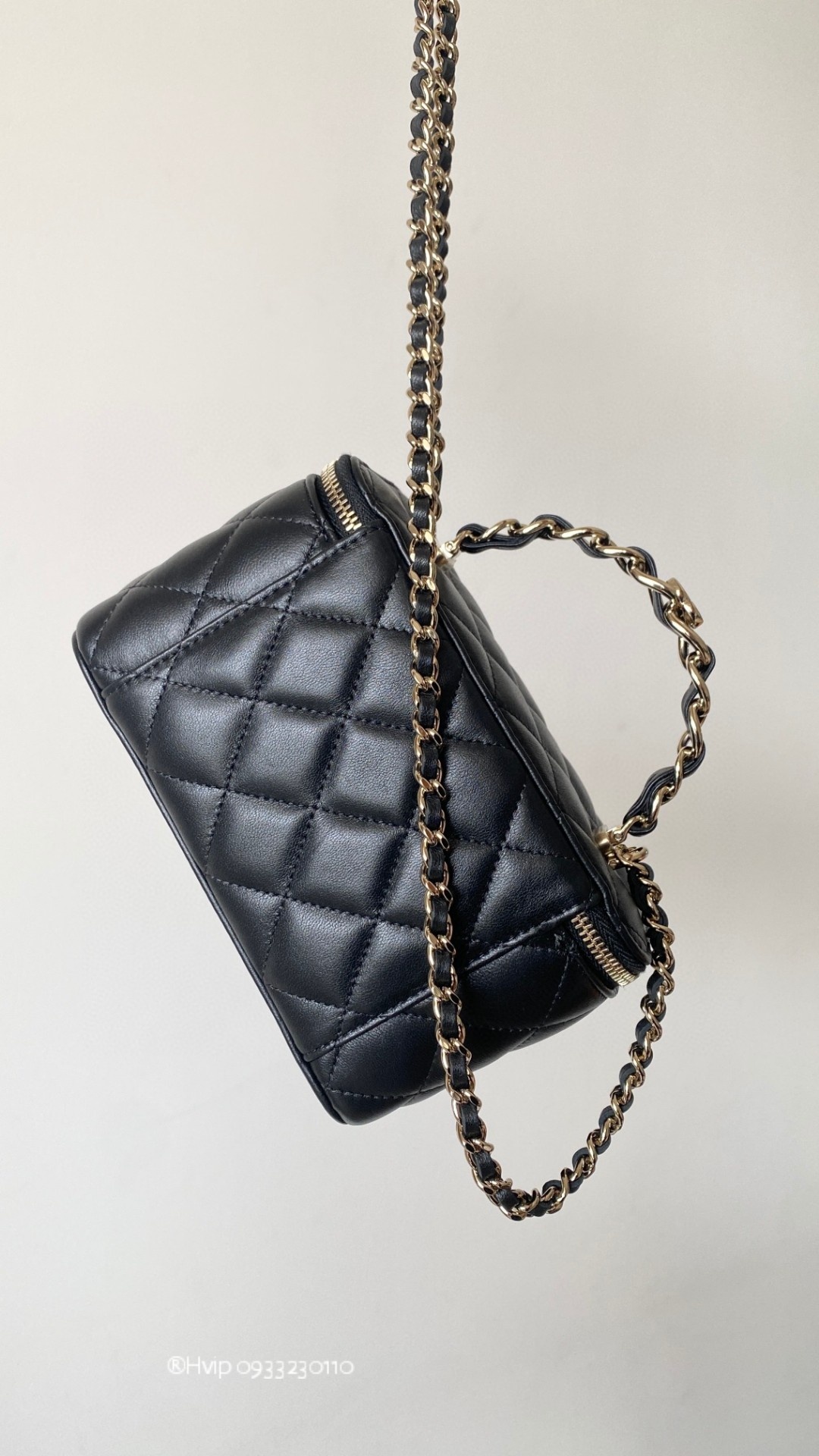Chanel flap bag with top handle