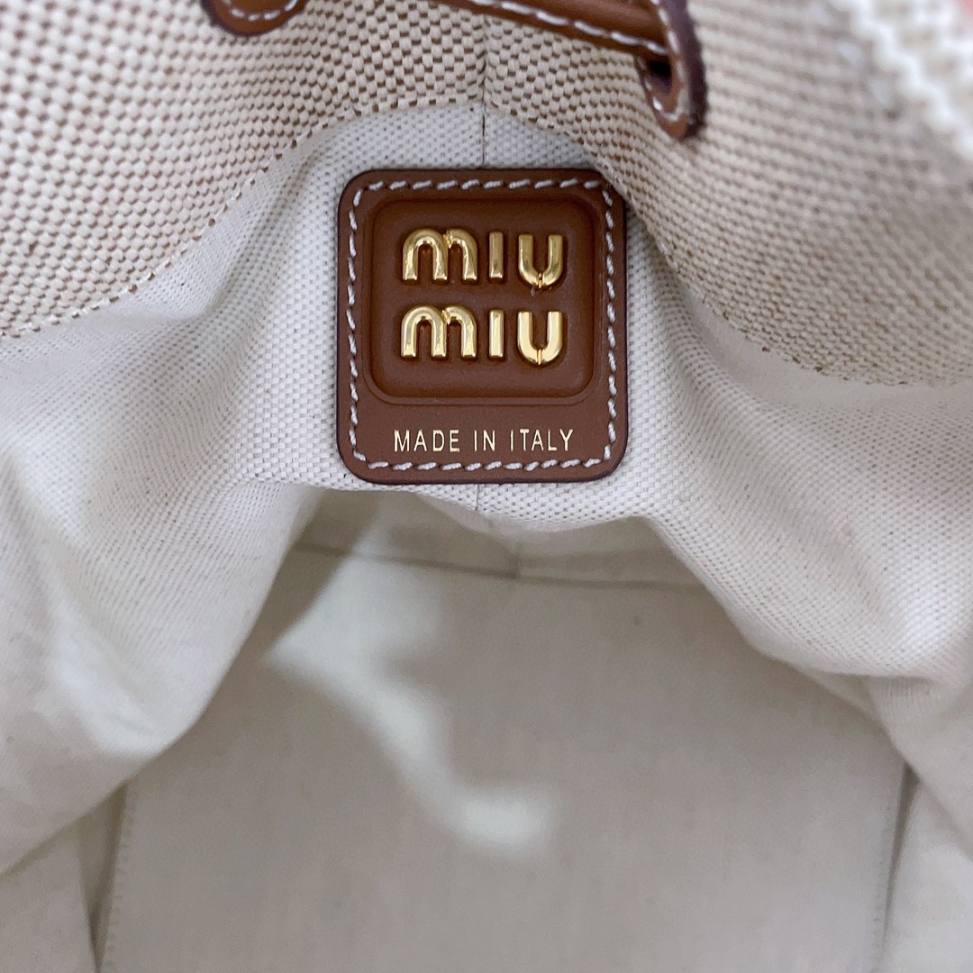 Miu Miu 5BE089 medium canvas bucket bag M1