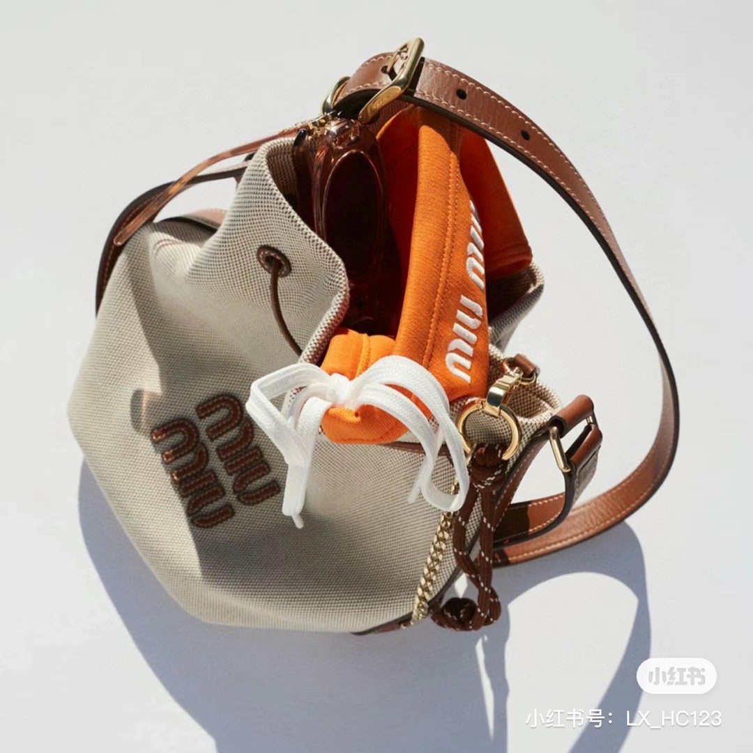 Miu Miu 5BE089 medium canvas bucket bag M1