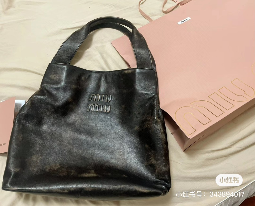 Miu Miu 5BC119_2F6P_F0V6L_V_OLM Nappa hobo bag with logo M1