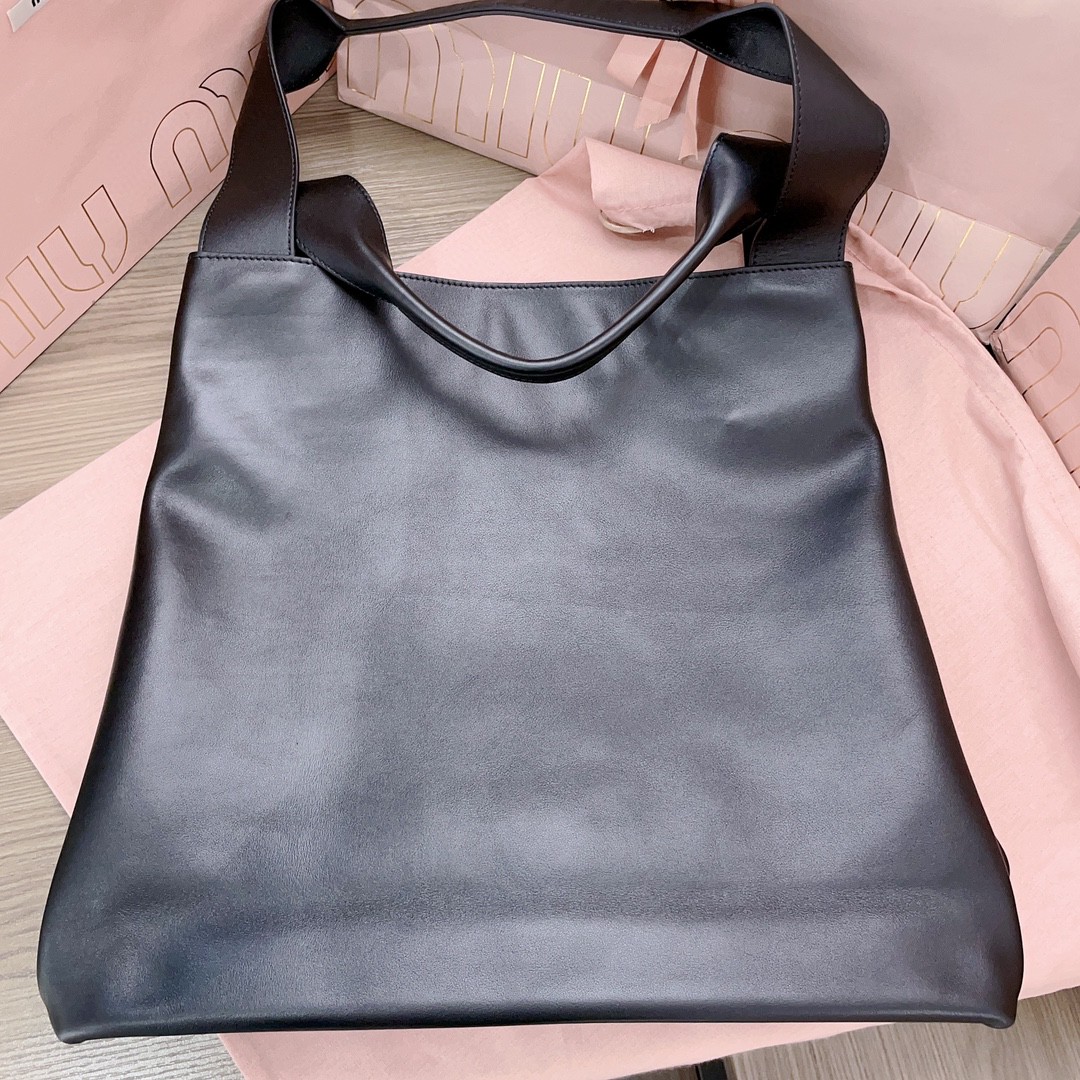 Miu Miu 5BC119_2DDJ_F0002_V_OLM Leather hobo bag black M1