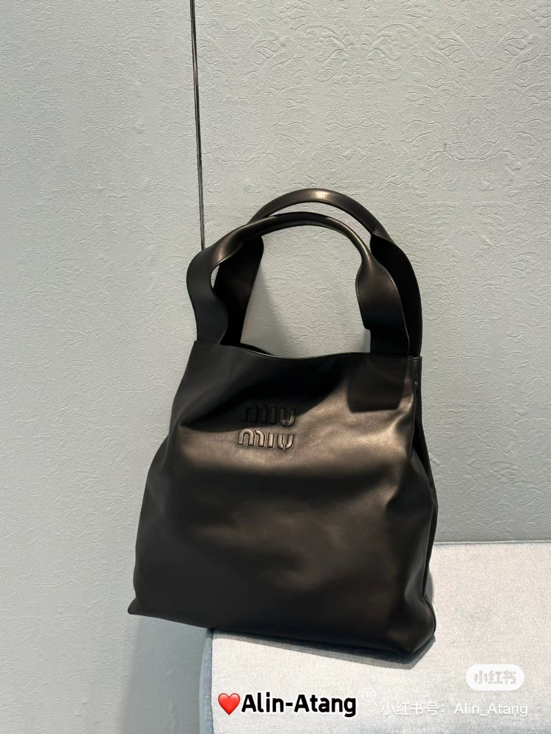 Miu Miu 5BC119_2DDJ_F0002_V_OLM Leather hobo bag black M1