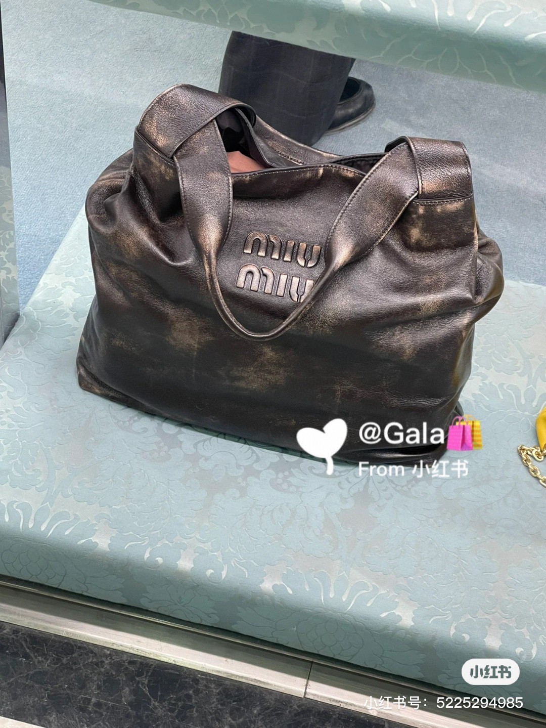 Miu Miu 5BC119_2F6P_F0V6L_V_OLM Nappa hobo bag with logo M1