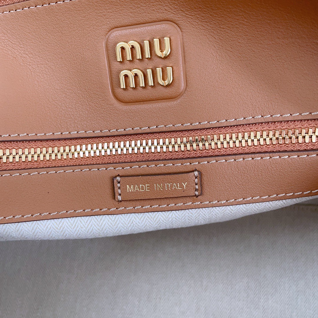 Miu Miu 5BA290_2CRM_F0046_V_OOO leather bag cognac M1