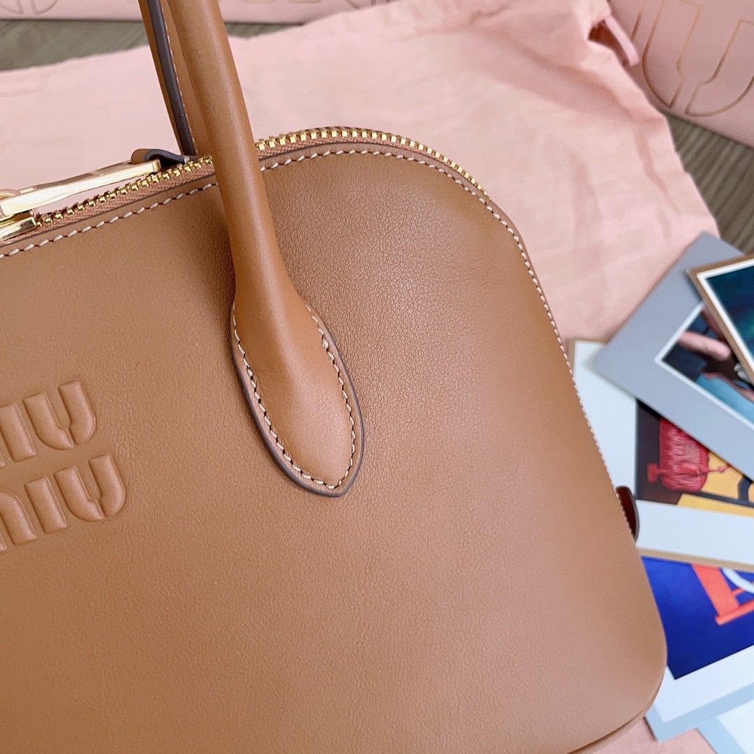 Miu Miu 5BA290_2CRM_F0046_V_OOO leather bag cognac M1