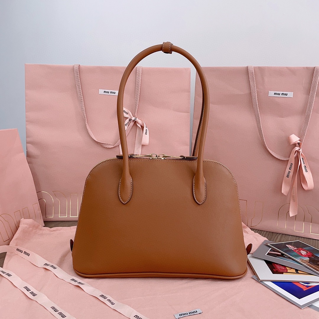 Miu Miu 5BA290_2CRM_F0046_V_OOO leather bag cognac M1