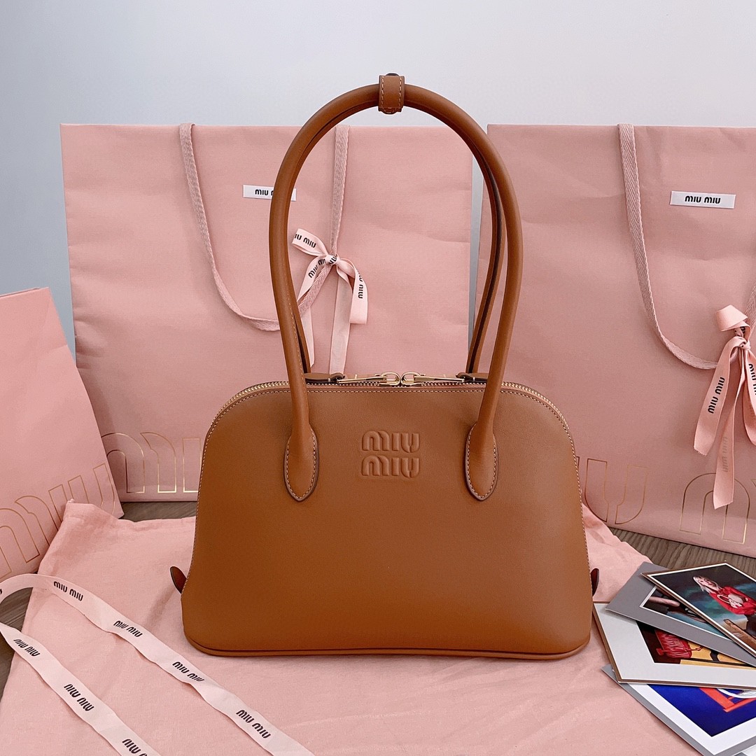 Miu Miu 5BA290_2CRM_F0046_V_OOO leather bag cognac M1