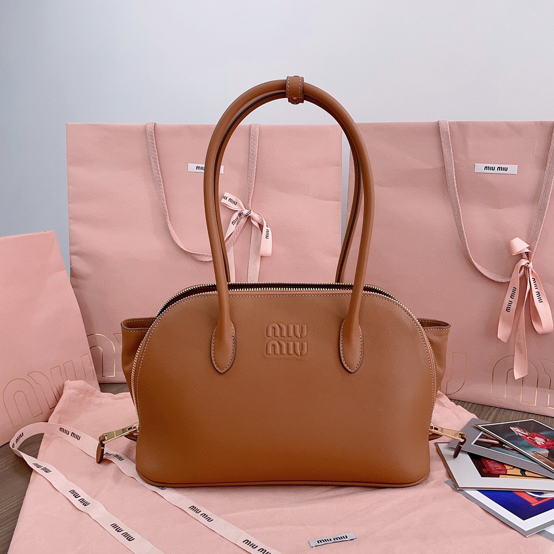 Miu Miu 5BA290_2CRM_F0046_V_OOO leather bag cognac M1